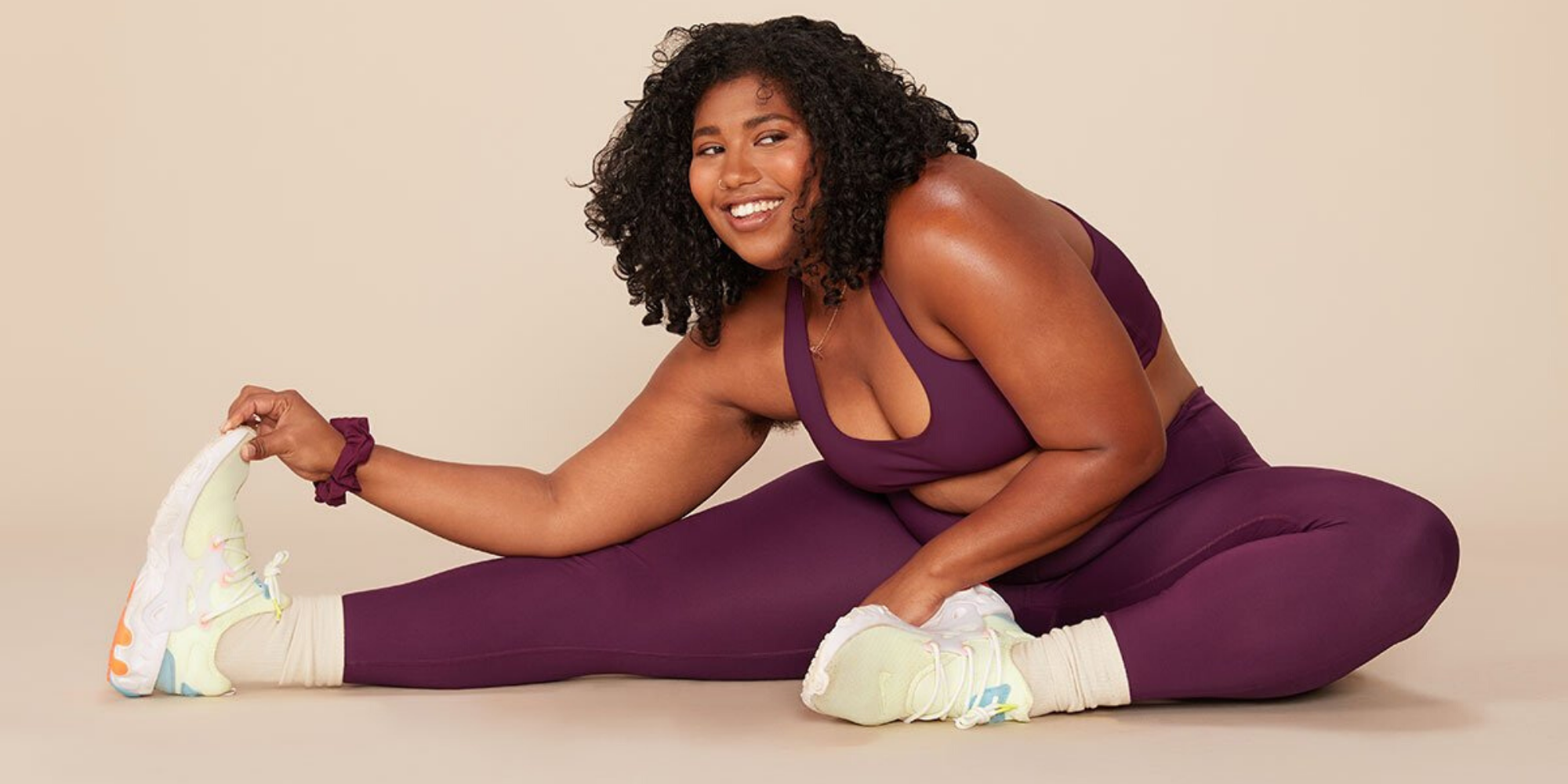 recycled plastic high rise legging in plum from sustainable company Girlfriend Collective