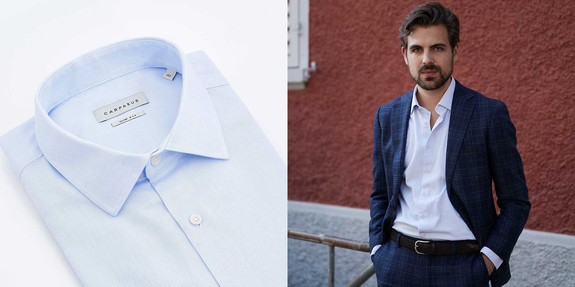 man wearing white CARPASUS sustainable workwear Oxford shirt