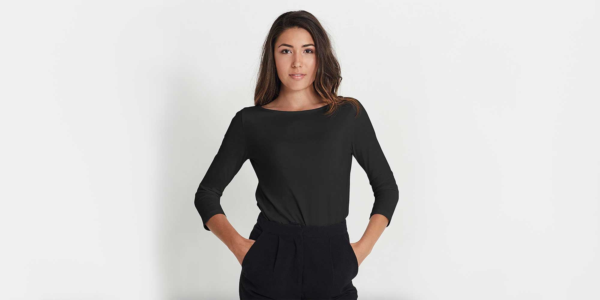 woman wearing black boatneck tee sustainably made by Citizen Wolf