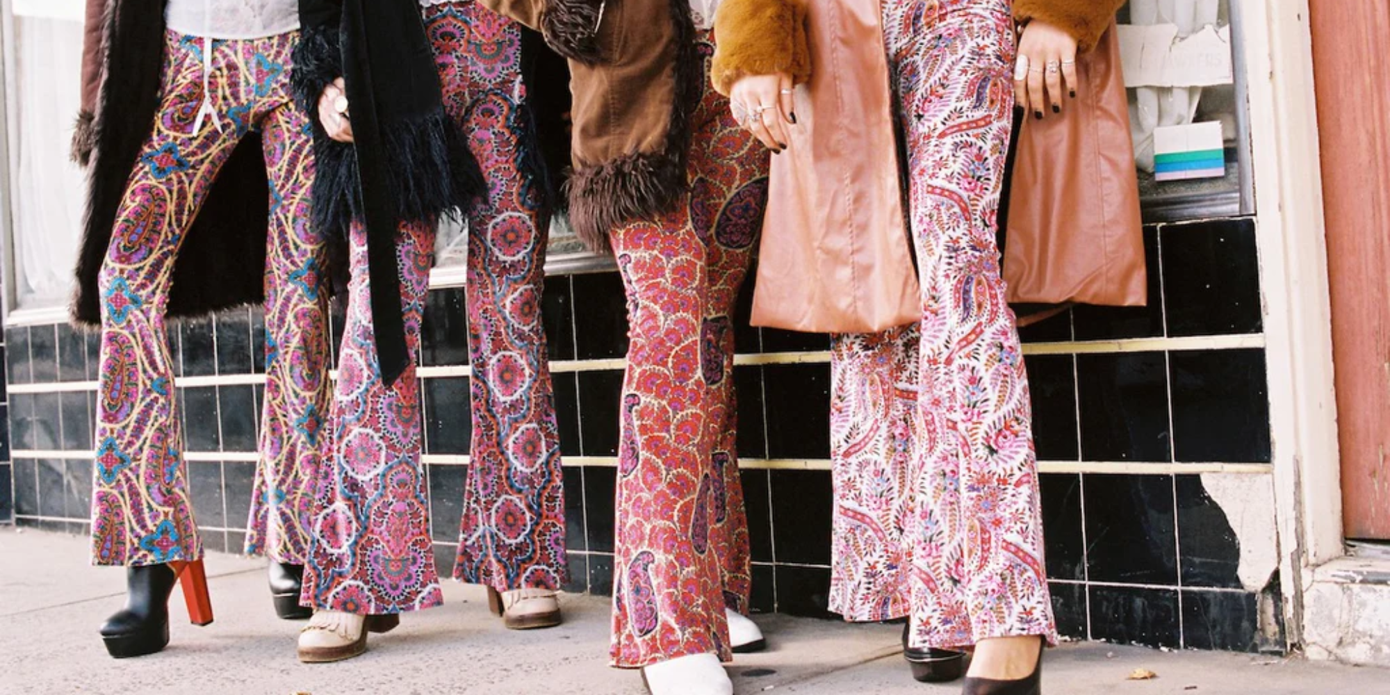 three people standing in Theodora Paisley Flares by Flare Street