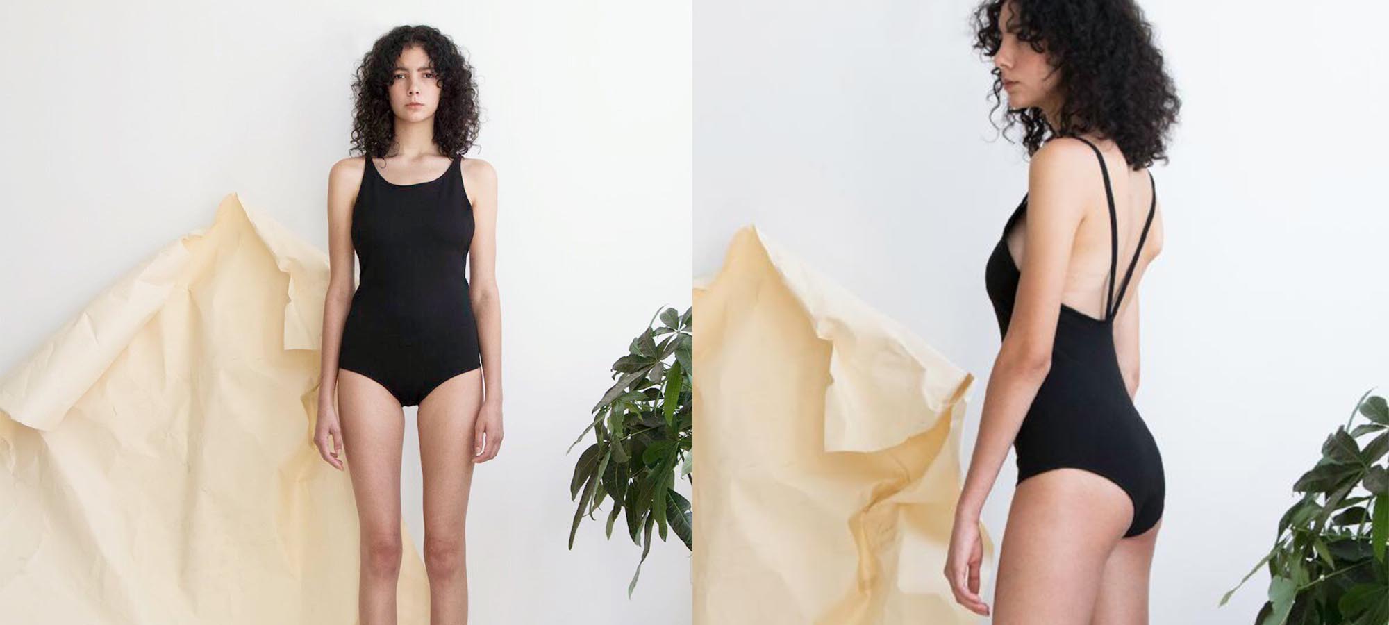woman wearing black part bodysuit by oh seven days