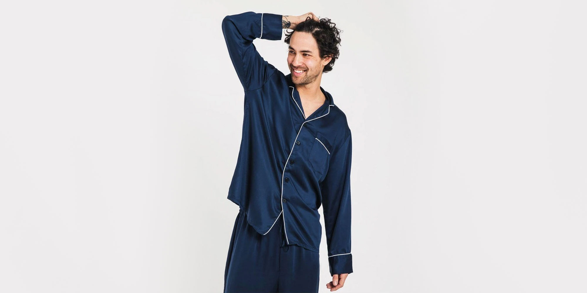 man wearing dark blue lyocell pyjamas set