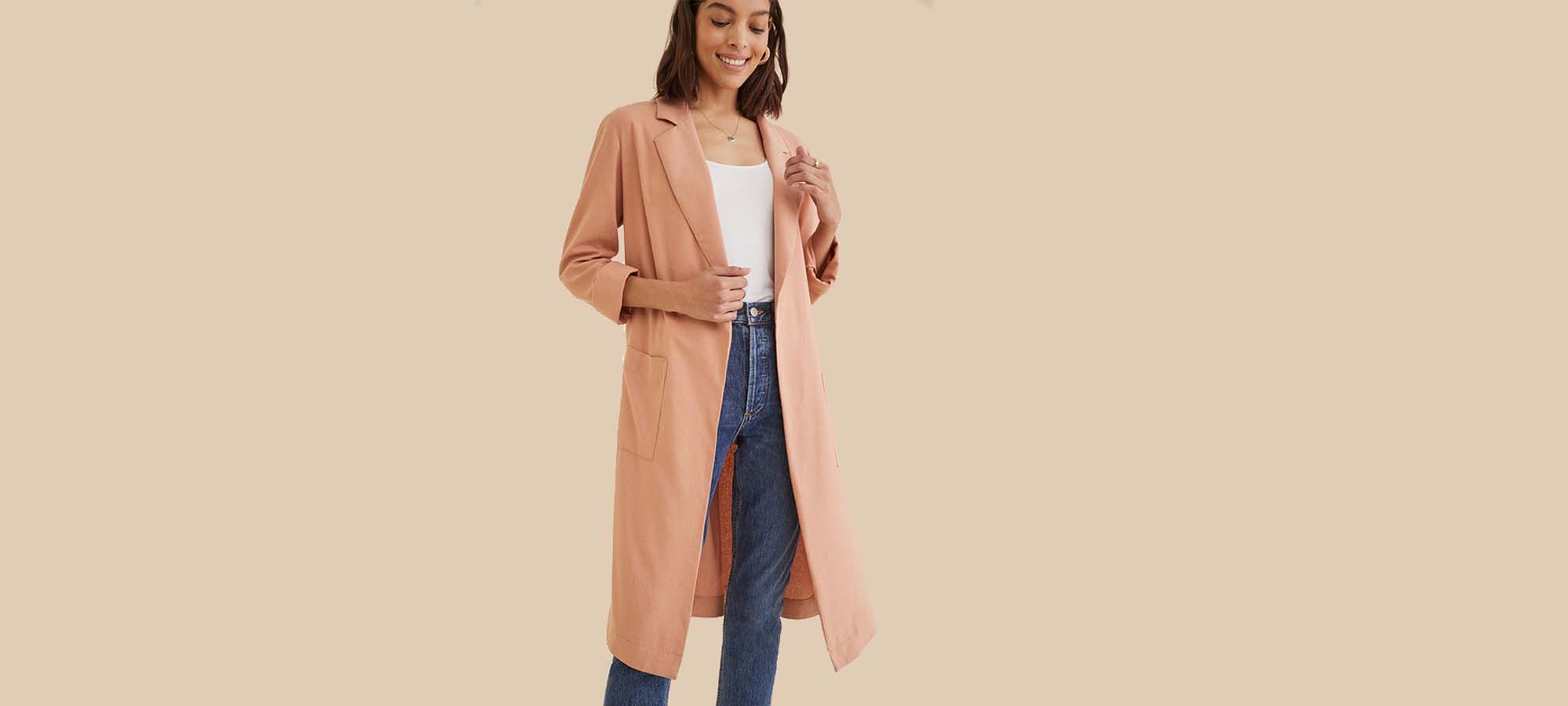 woman wearing peach amour vert trench