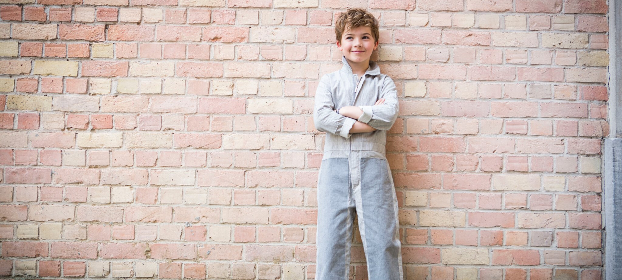 boy wearing jackalo ethical outfit