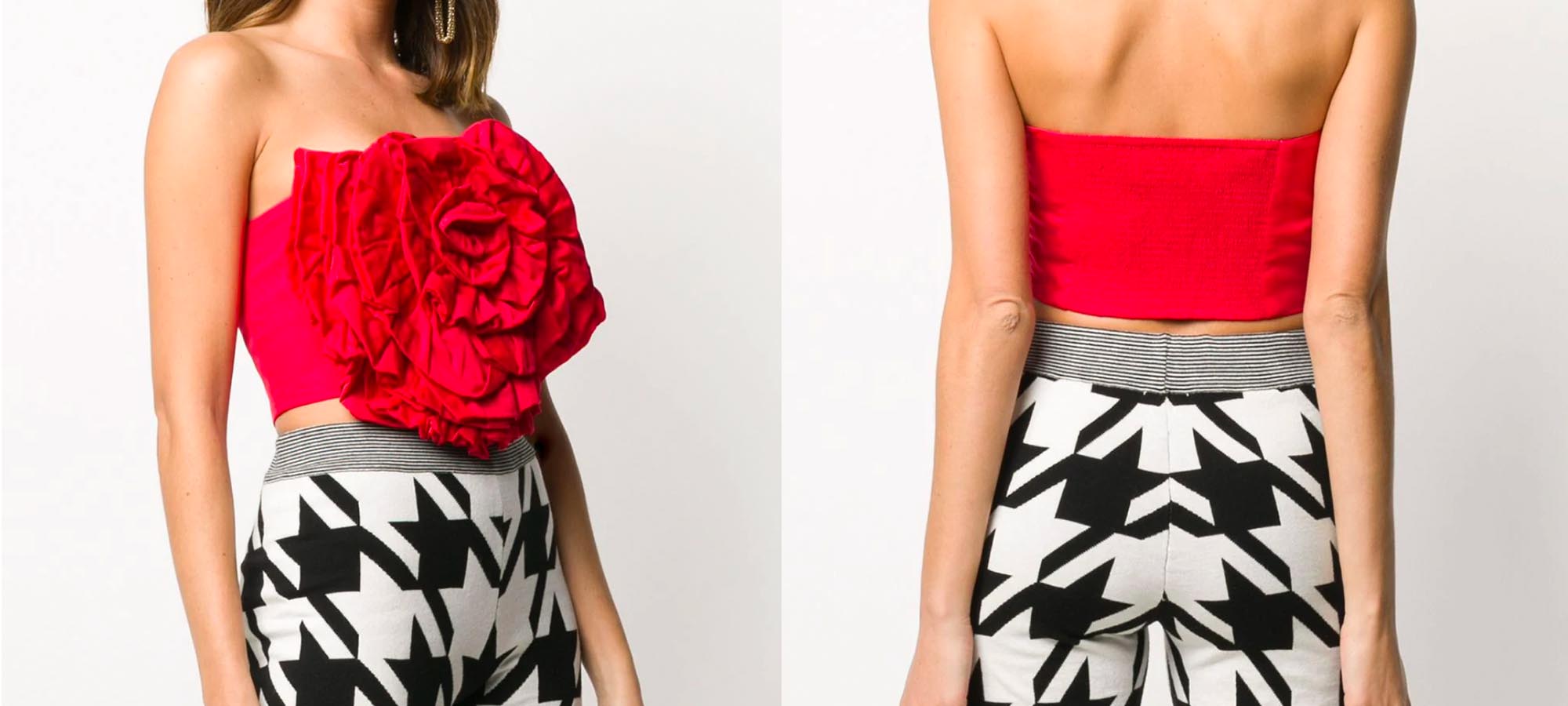 woman wearing red flower strapless top by mara hoffman