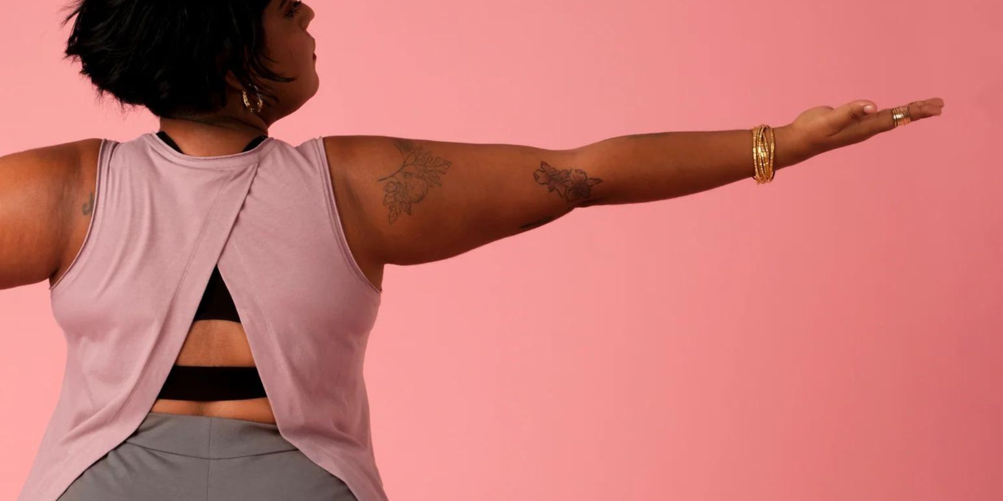 A split-back lilac yoga tank top by No Nasties.