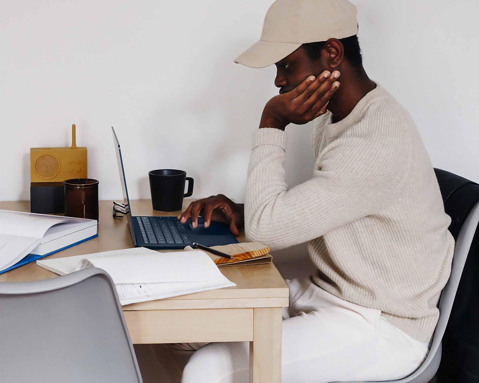 man working on his computer