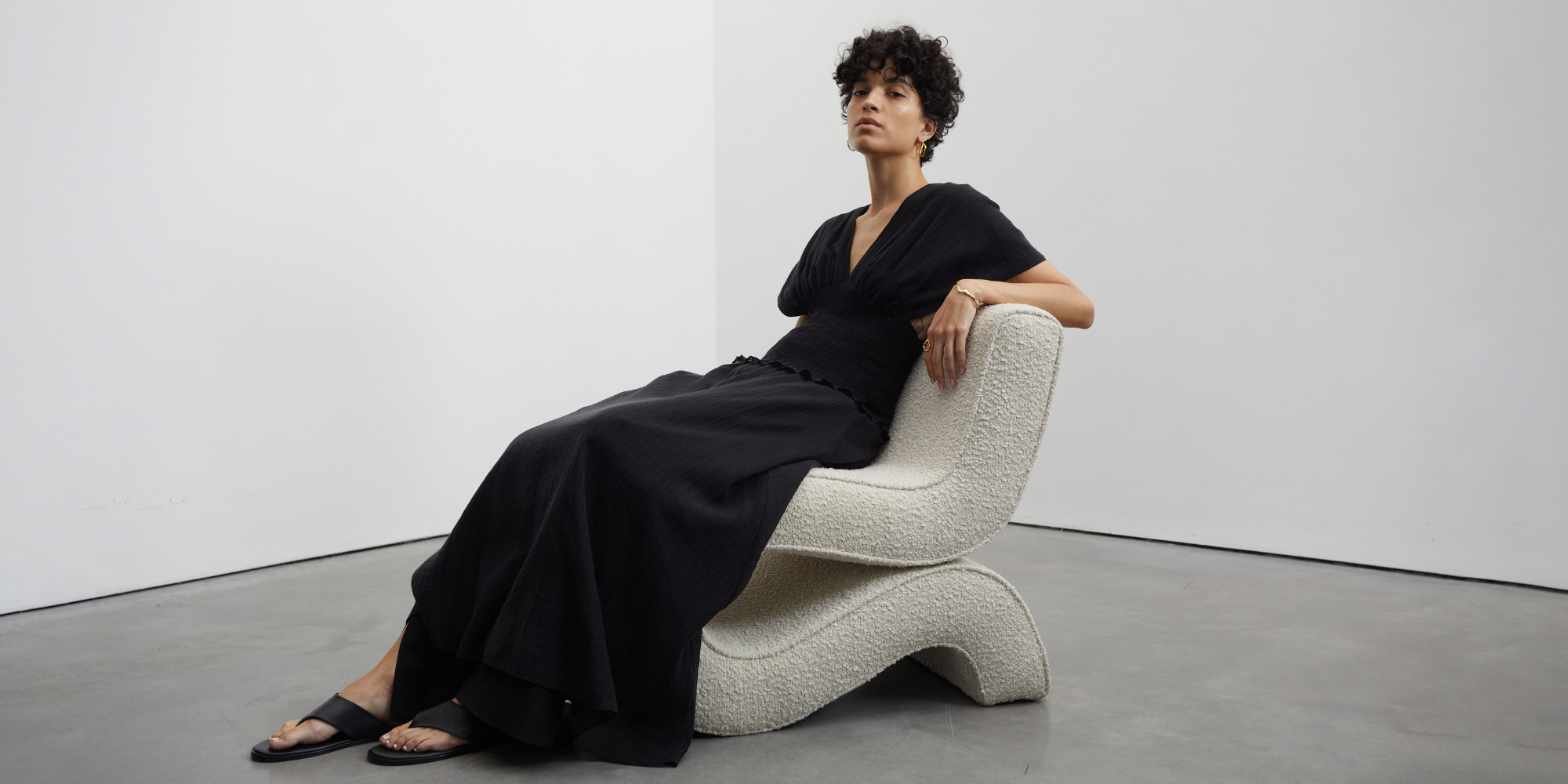 Someone in maxi dress by Mother of Pearl.