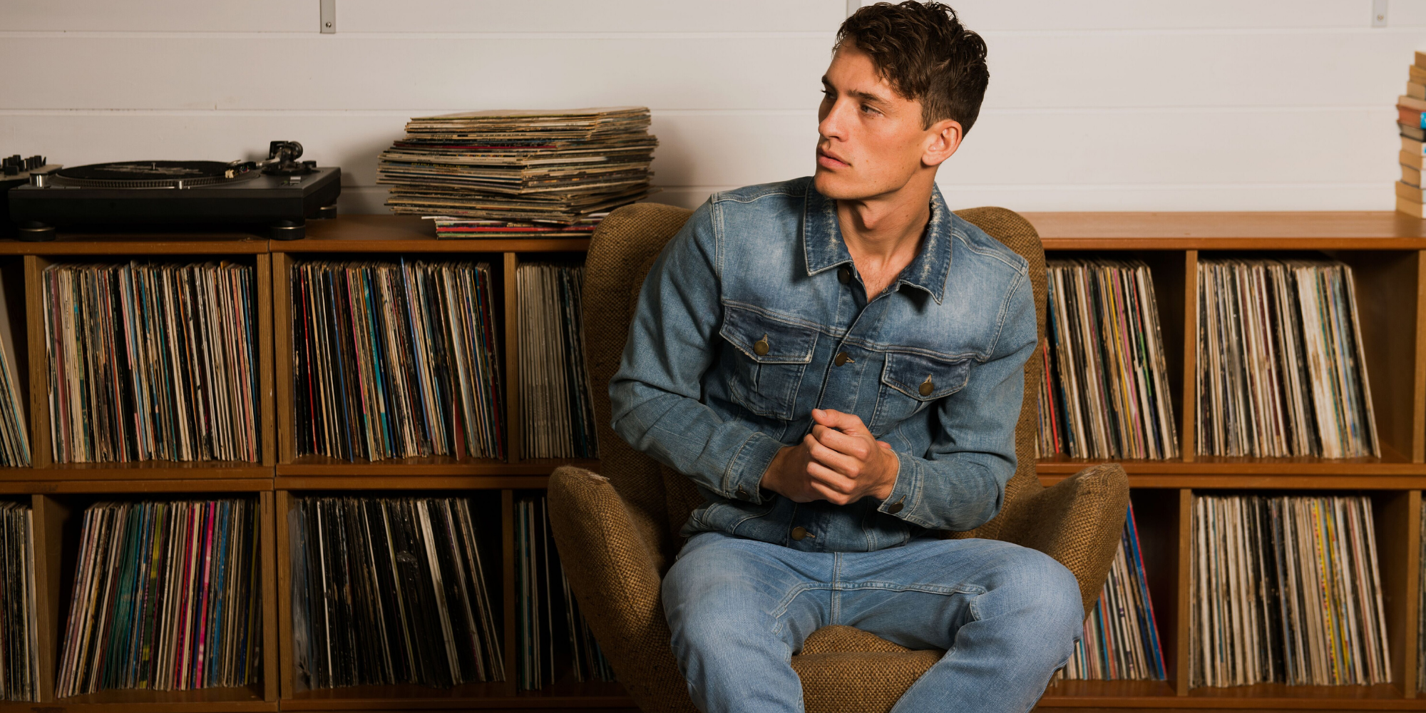 man in ethical denim coat and jeans from outland denim