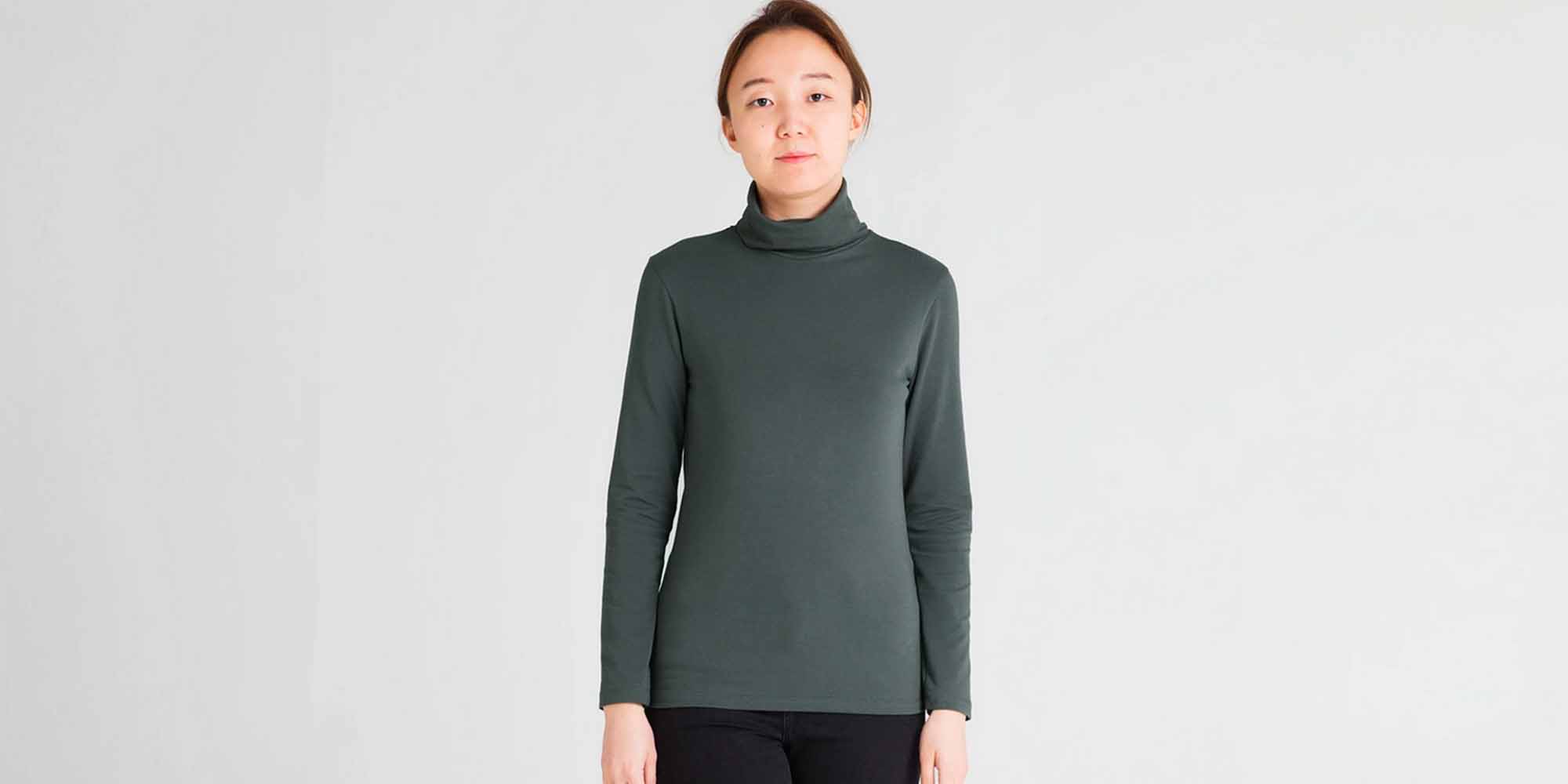 woman wearing grey dorsu turtleneck