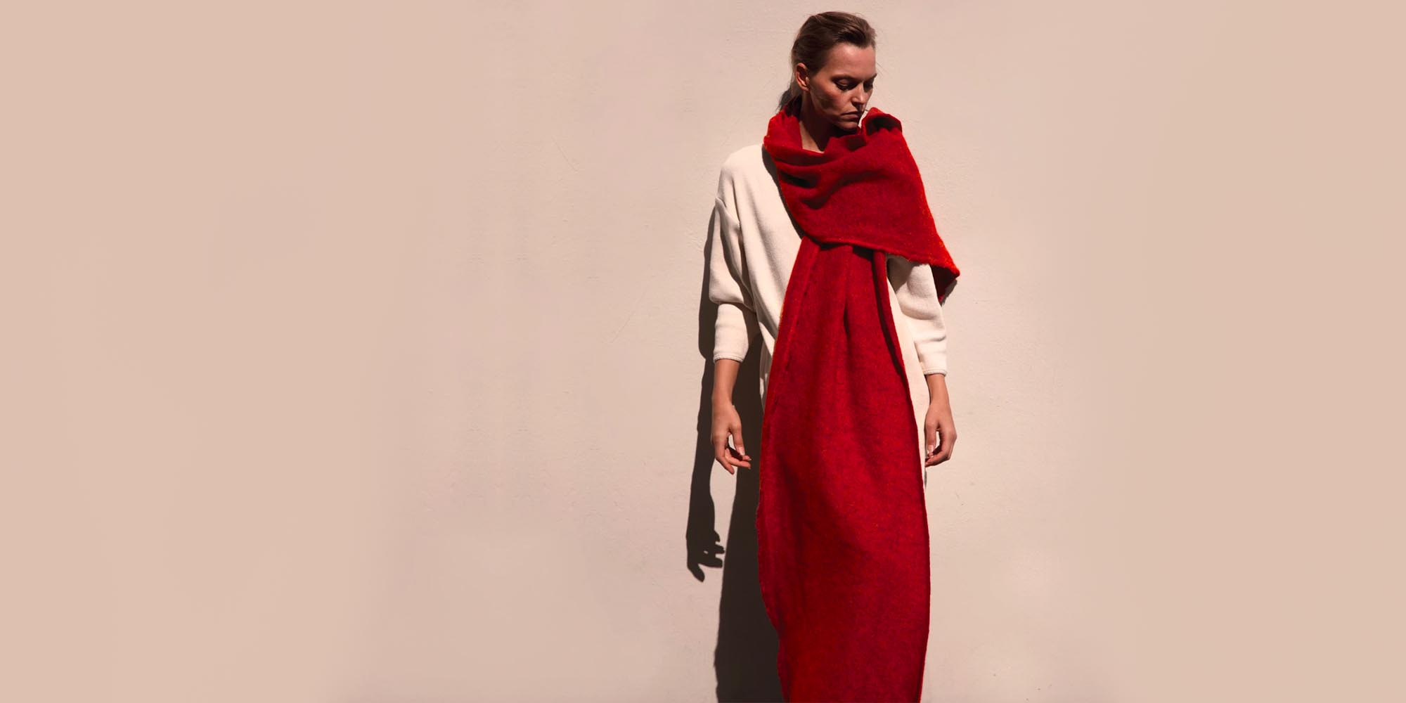 womena wearing red sustainable taiyo scarf