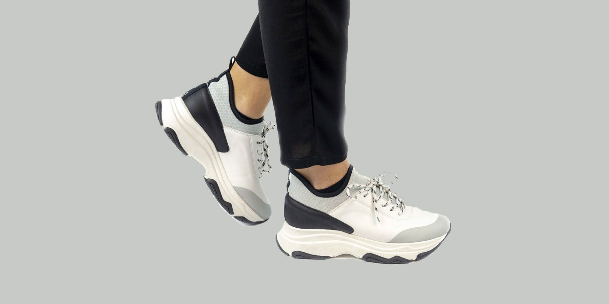 man wearing nae sneakers