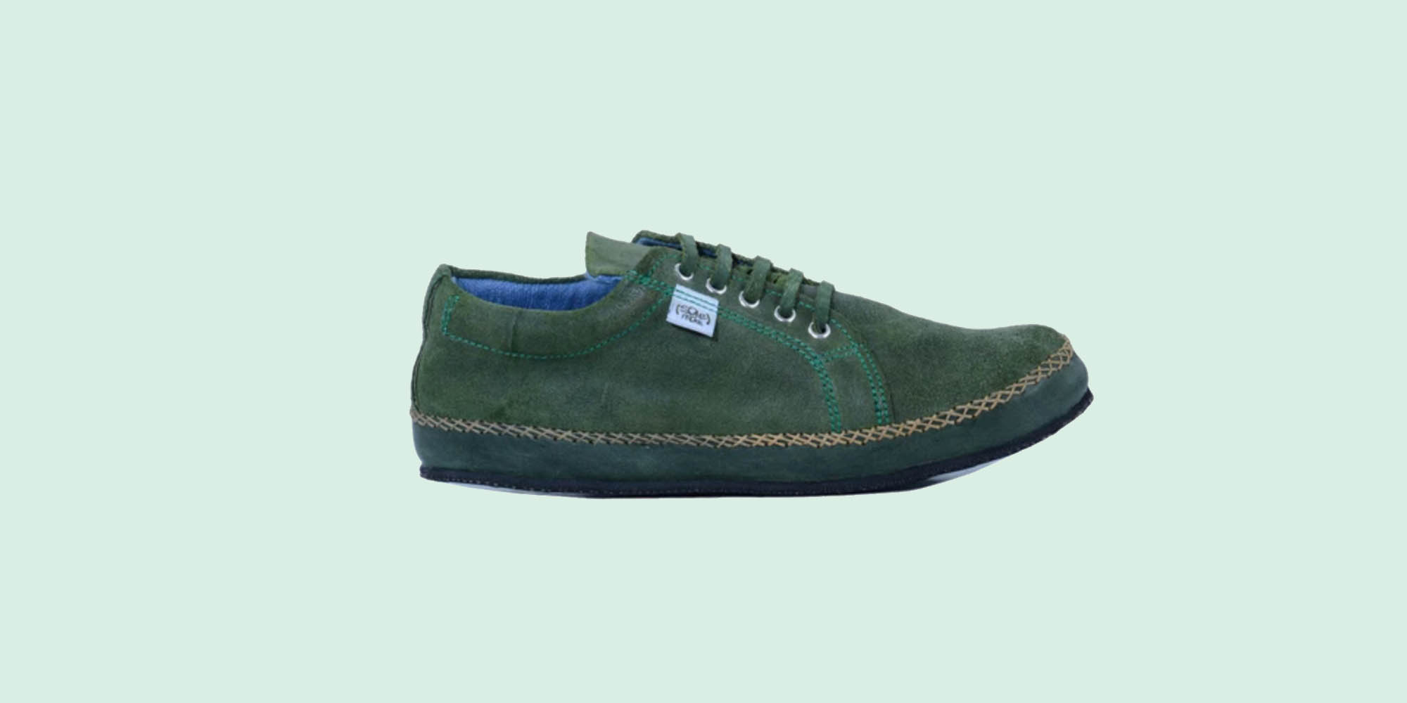 dark green ethical sneakers by solerebels