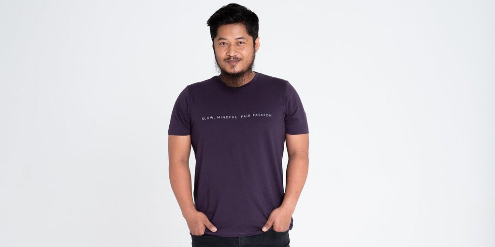 man of colour wearing ethical slogan tee by sustainable brand dorsu