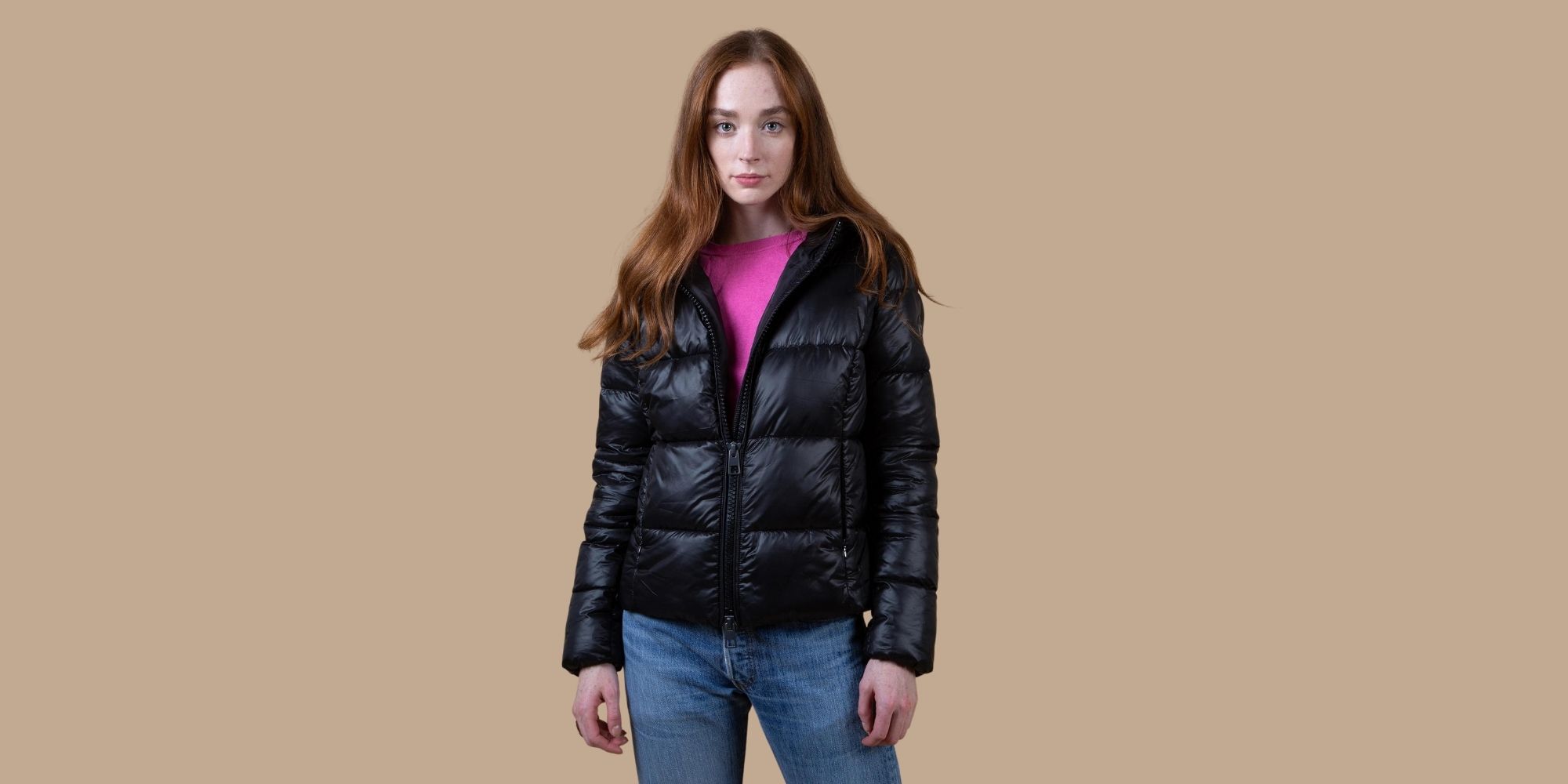 A black vegan sustainable winter essential puffer jacket ethically made by Culthread.