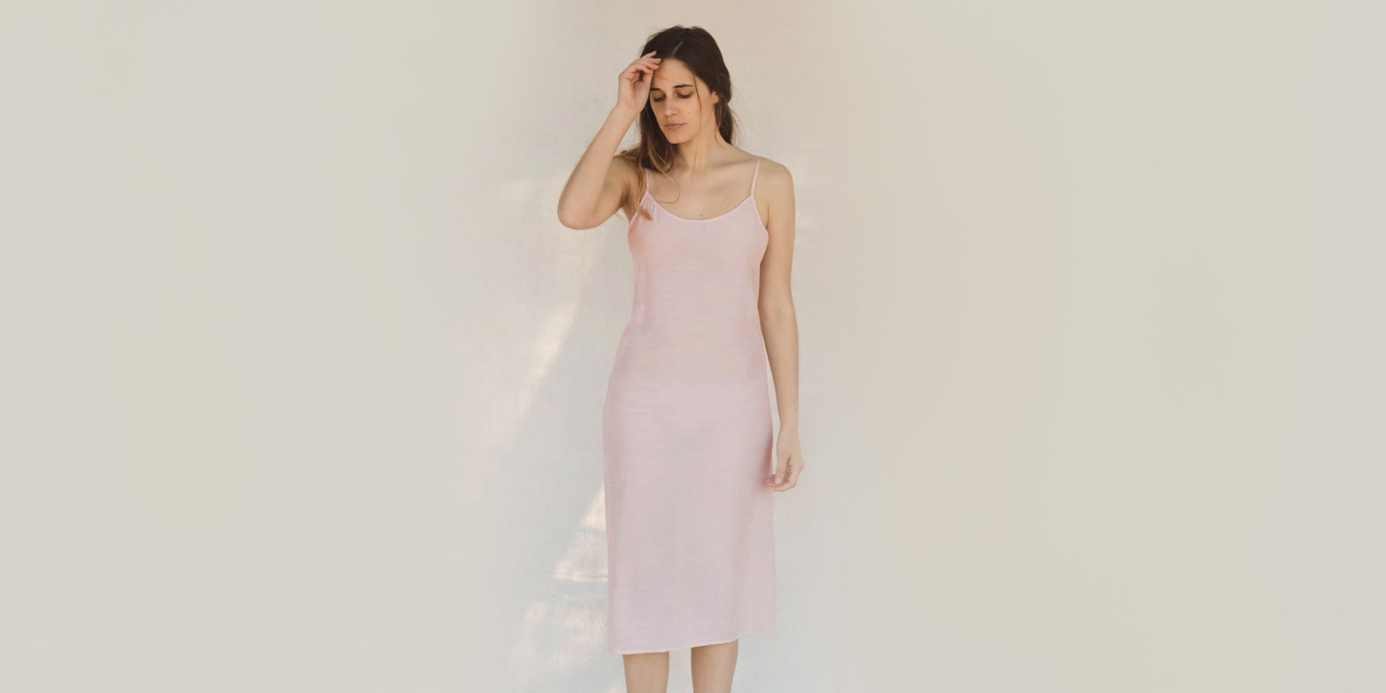 woman wearing pink christy dawn slip dress