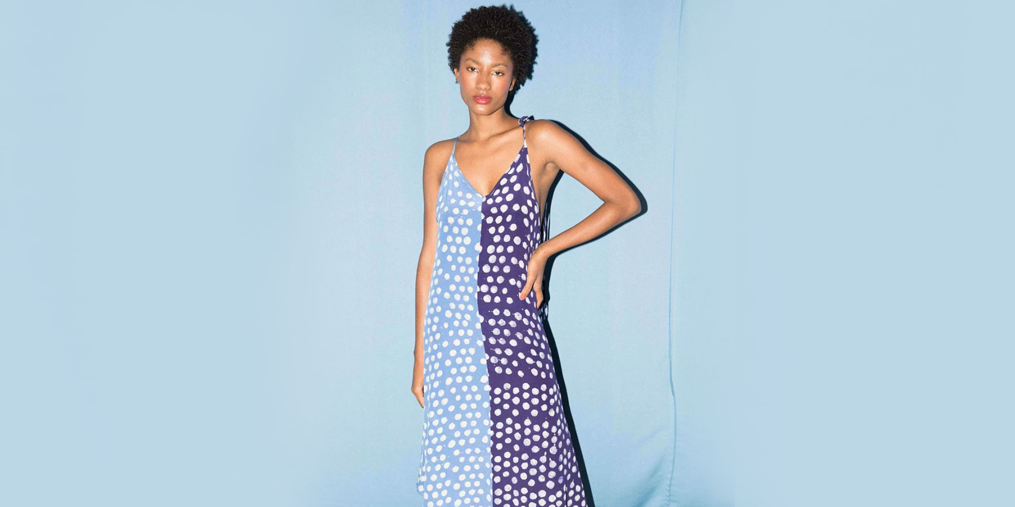 woman wearing blue dotted slip dress by studio 189