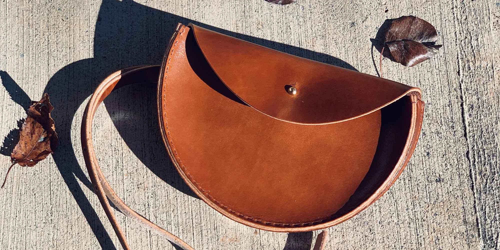 simple leather half moon bag by Tree Fairfax