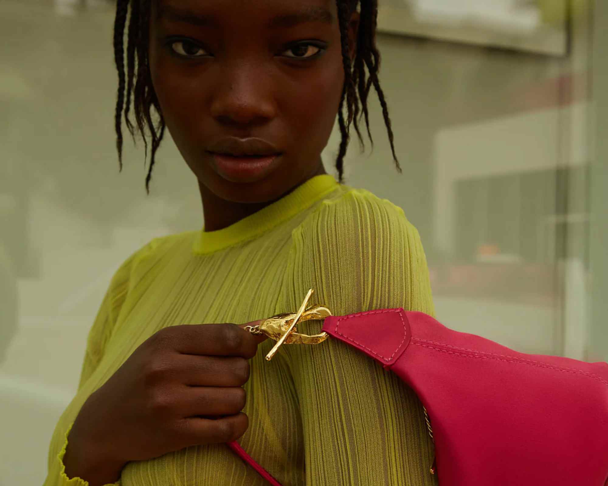 person carrying pink mashu bag