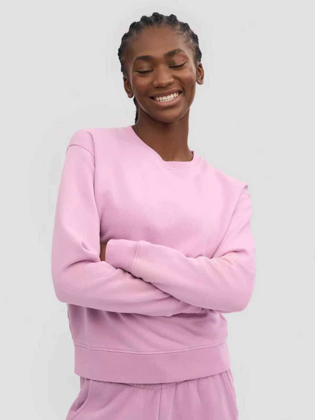 person smiling wearing colorful standard clothing