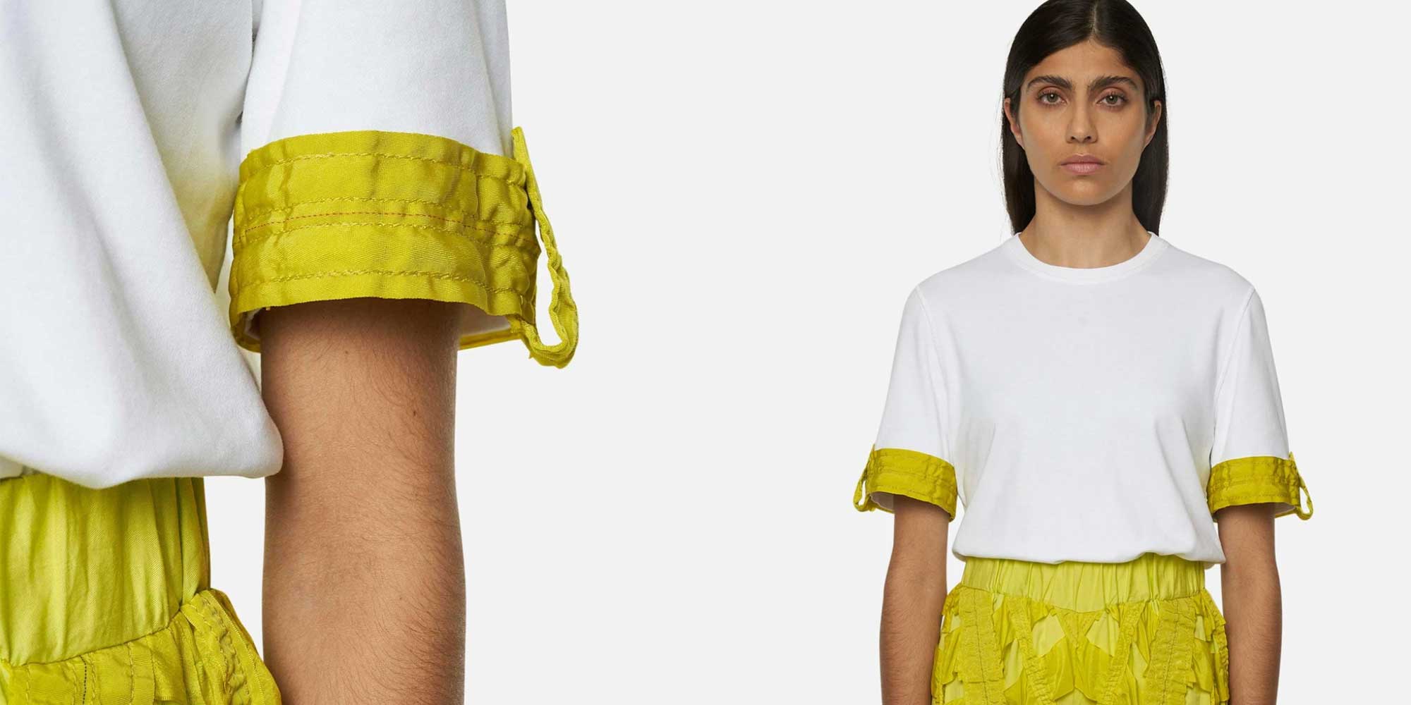 woman wearing white and yellow tshirt from raeburn