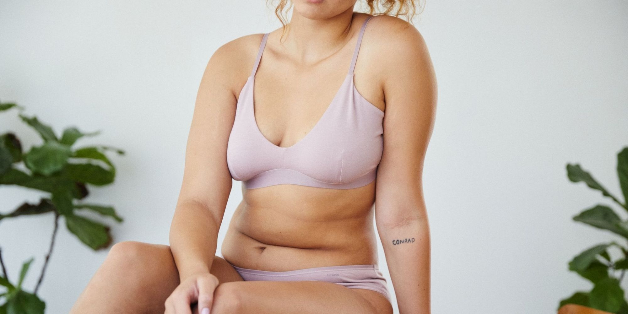 woman wearing sustainable bralette by tentree