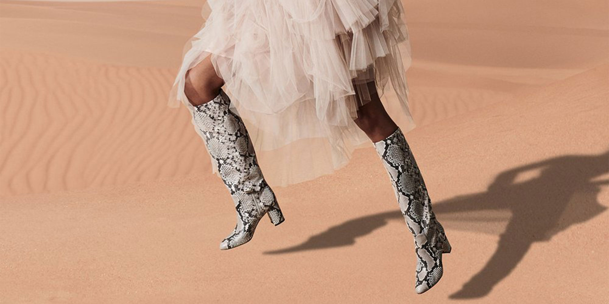 woman wearing high fake croco boots by aera