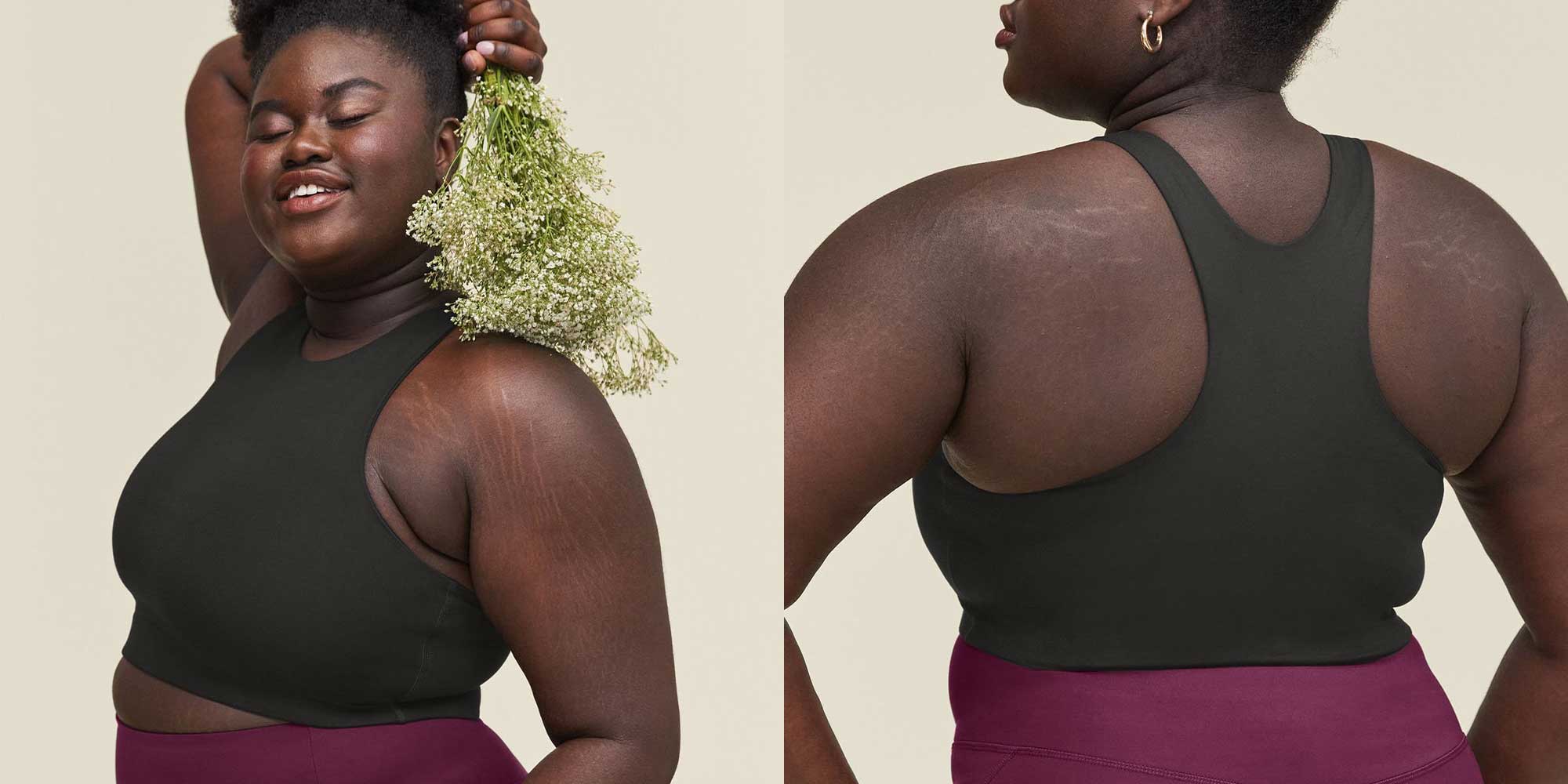 woman wearing dark green sports bra by girlfriend collective