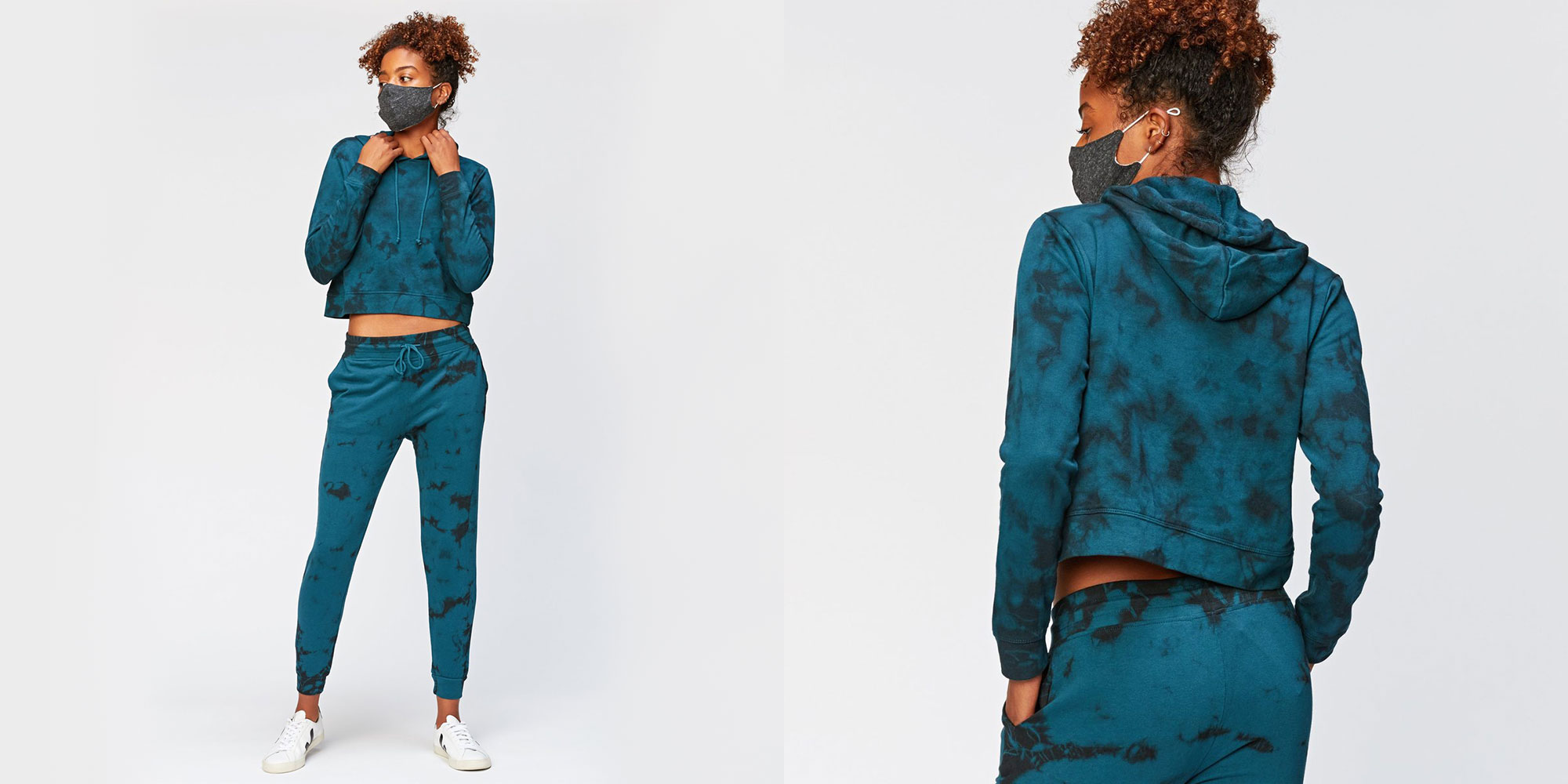 woman wearing blue and black tie dye hoodie by threads 4 thought