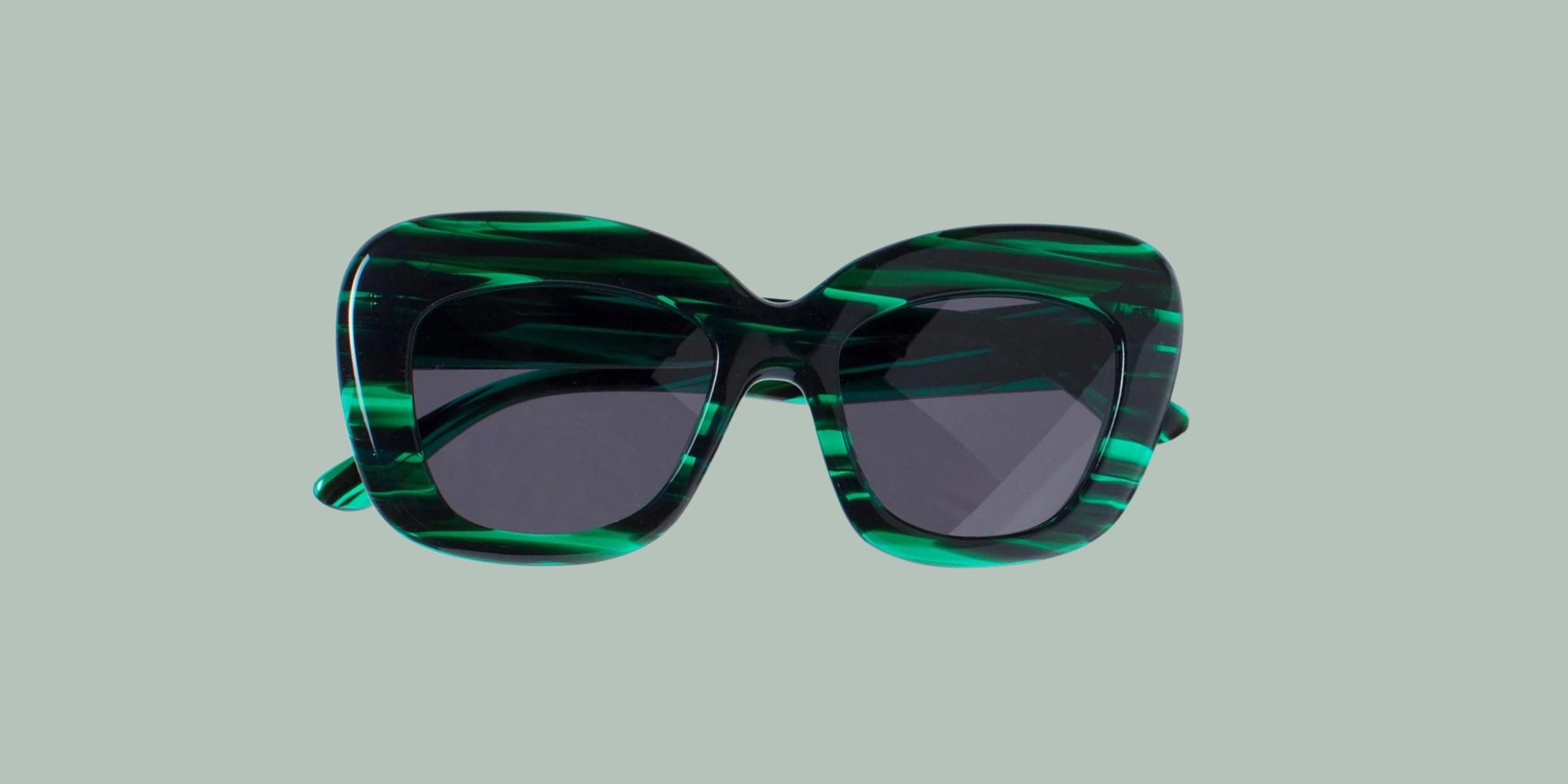 Teal and black print thick framed Kittan sunglasses by ELK.