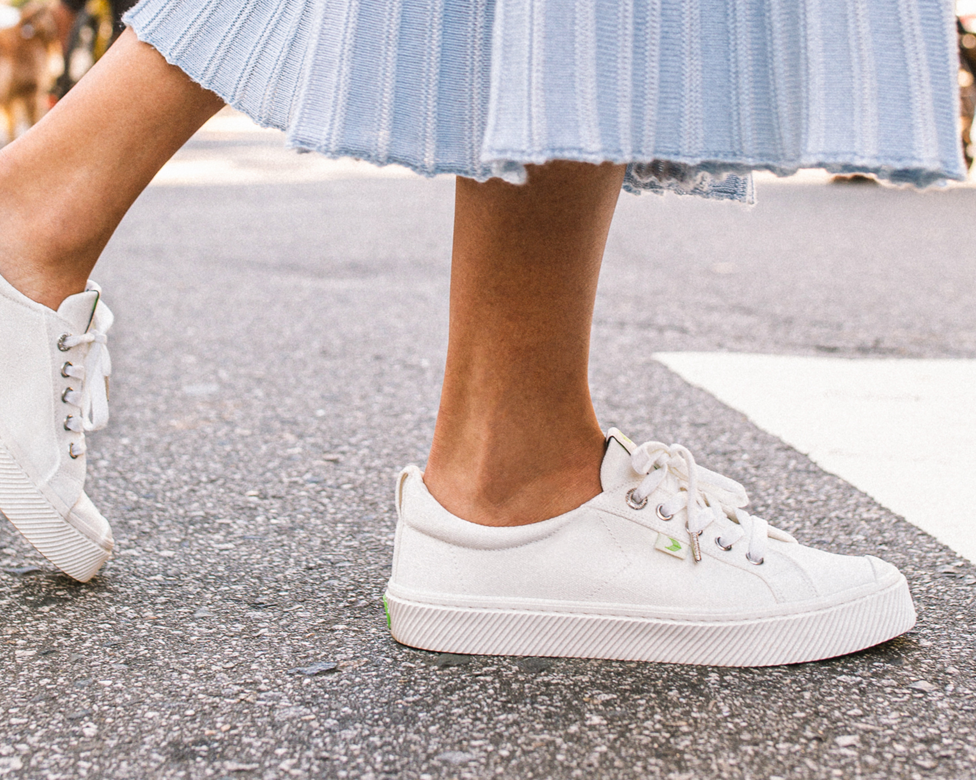 white sustainable sneakers by Cariuma