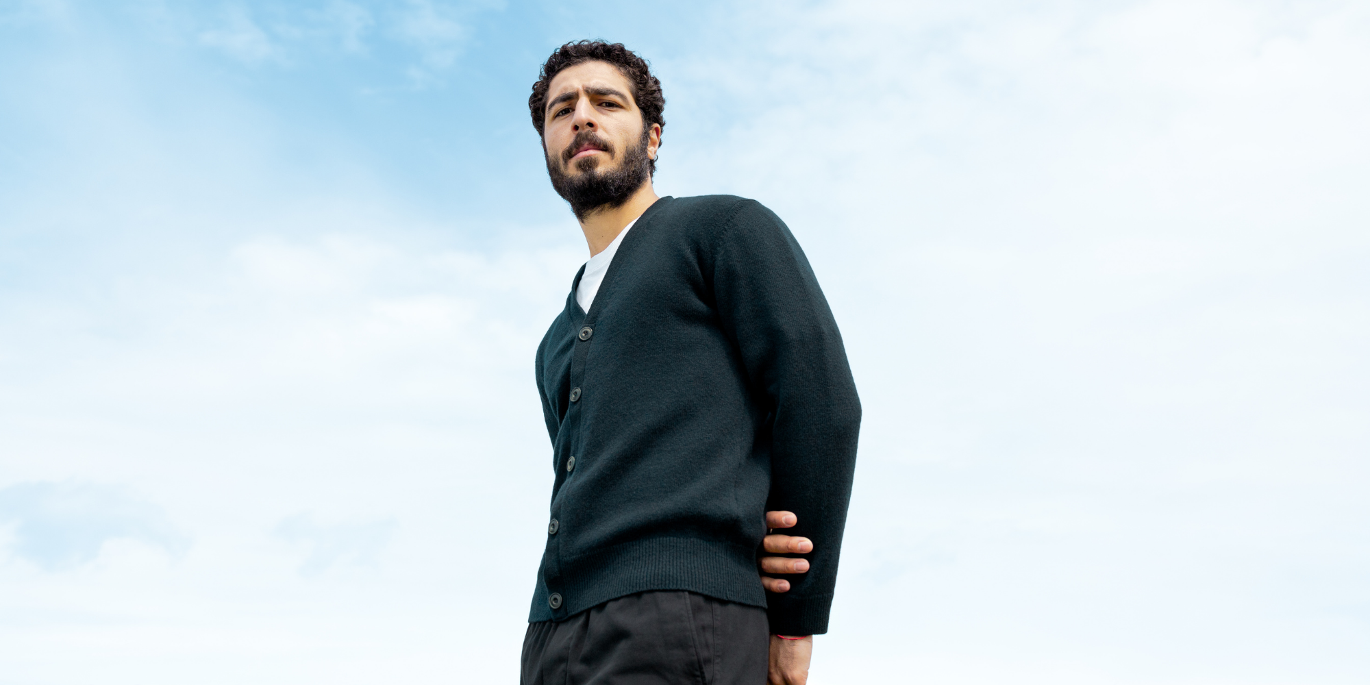 image of person in shirt, cardigan and trousers by Unrecorded