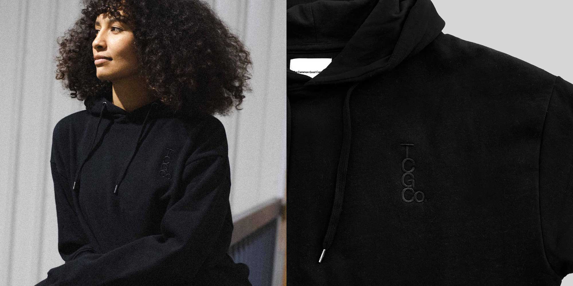 close up of woman wearing black sustainable hoodie by the common good company