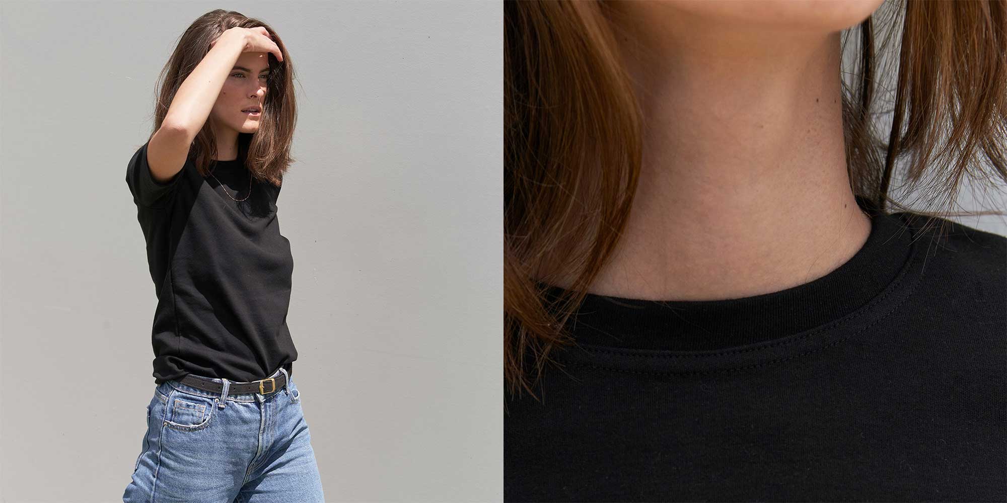 white woman wearing mid sleeve sustainable black shirt by Mila.Vert