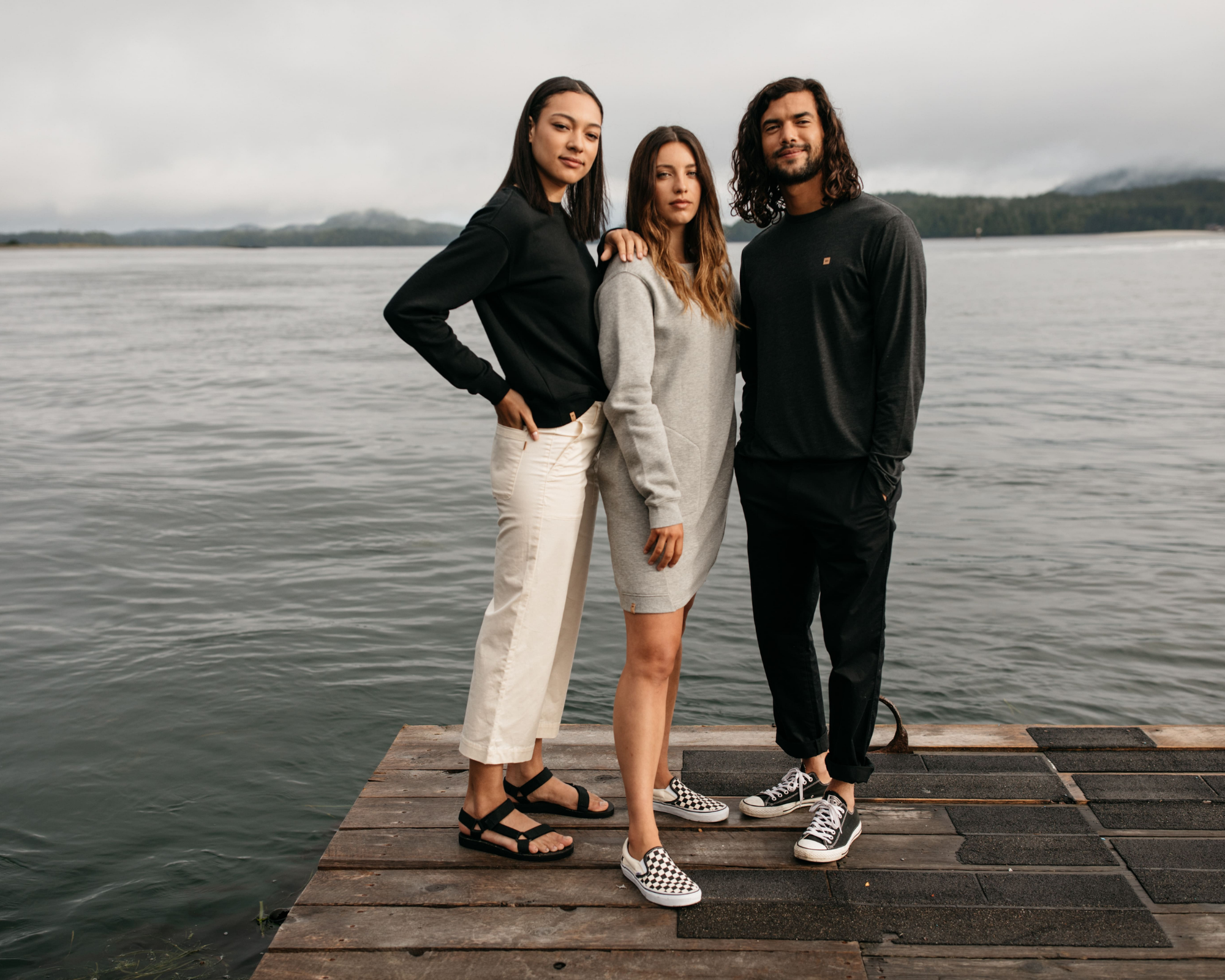 two women and a man wearing sustainable clothes by ethical Canadian brand tentree