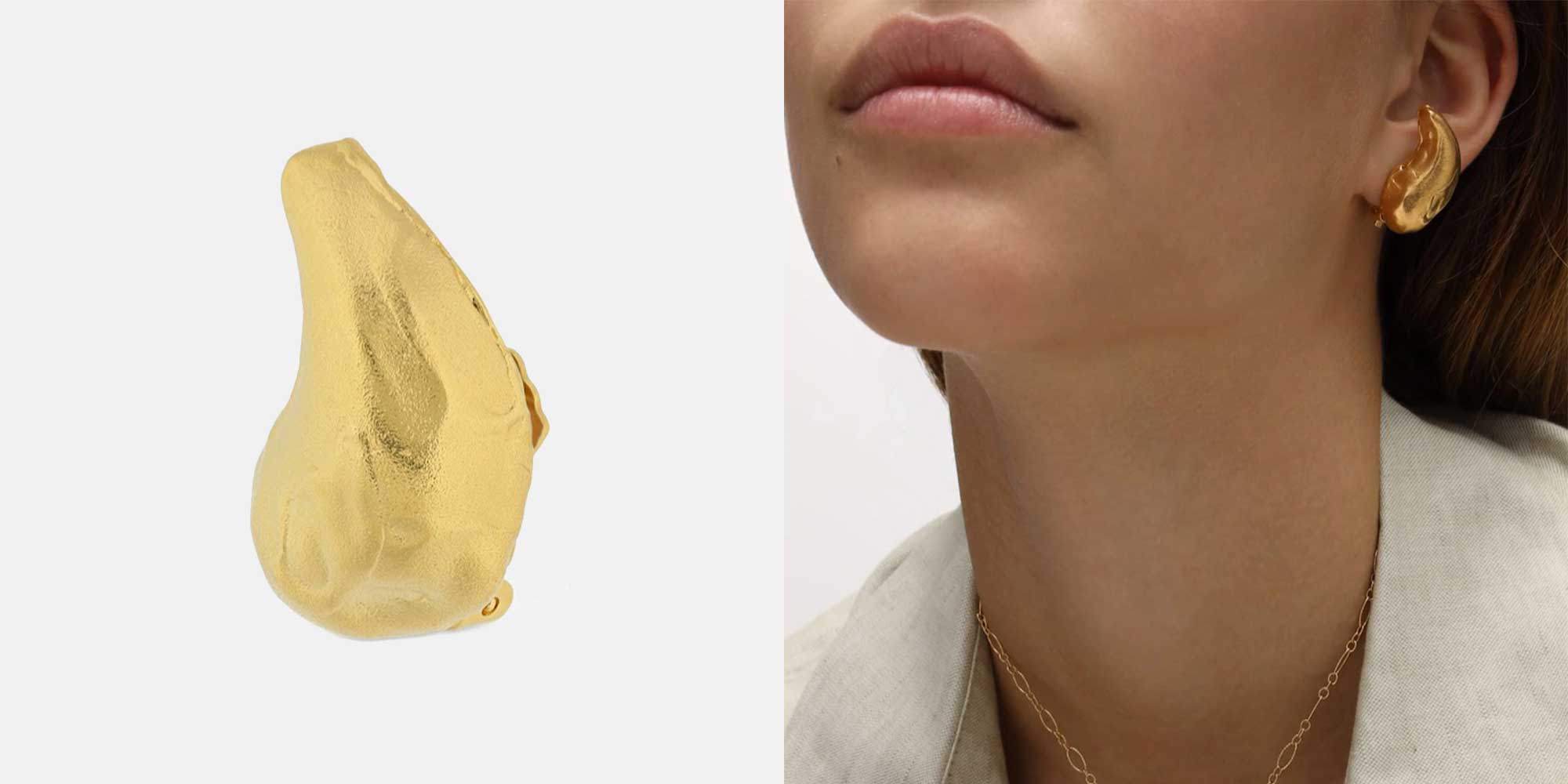 woman wearing gold pendant earrings by alighieri