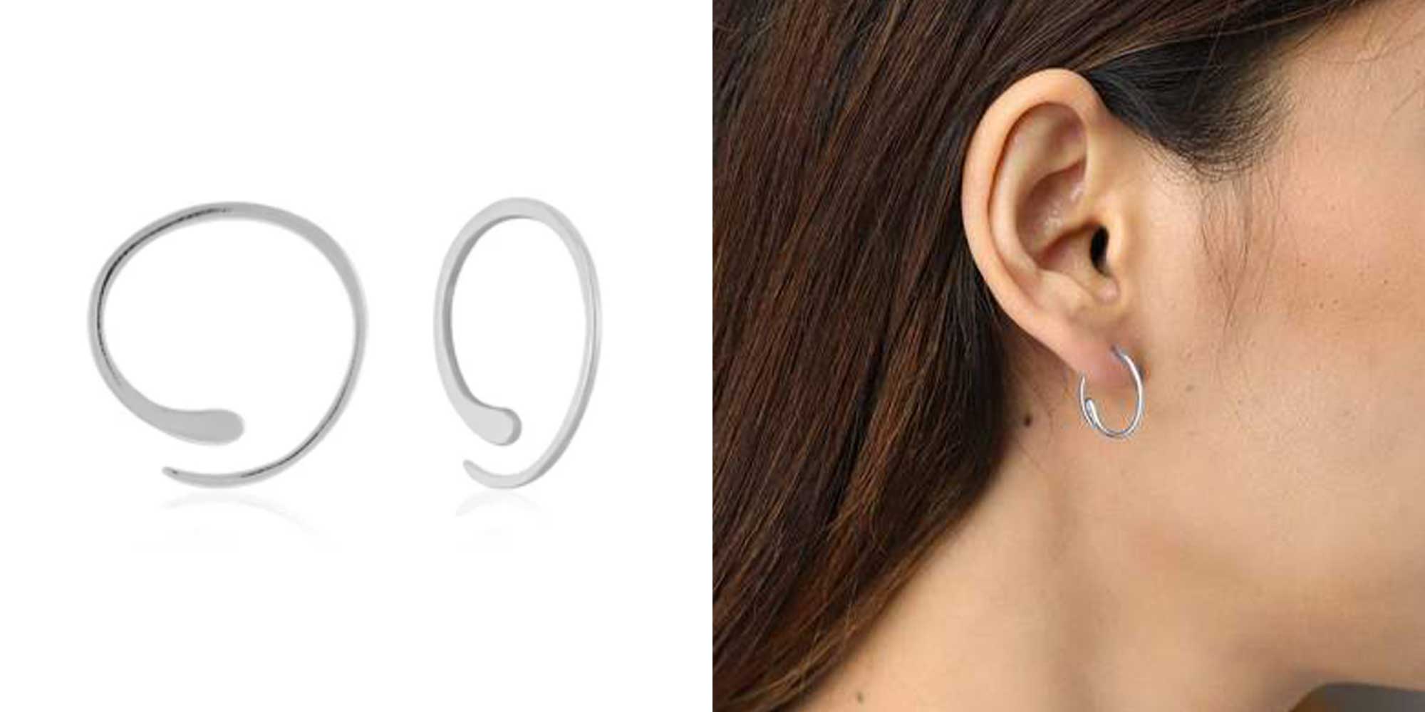 woman wearing silver boma earrings