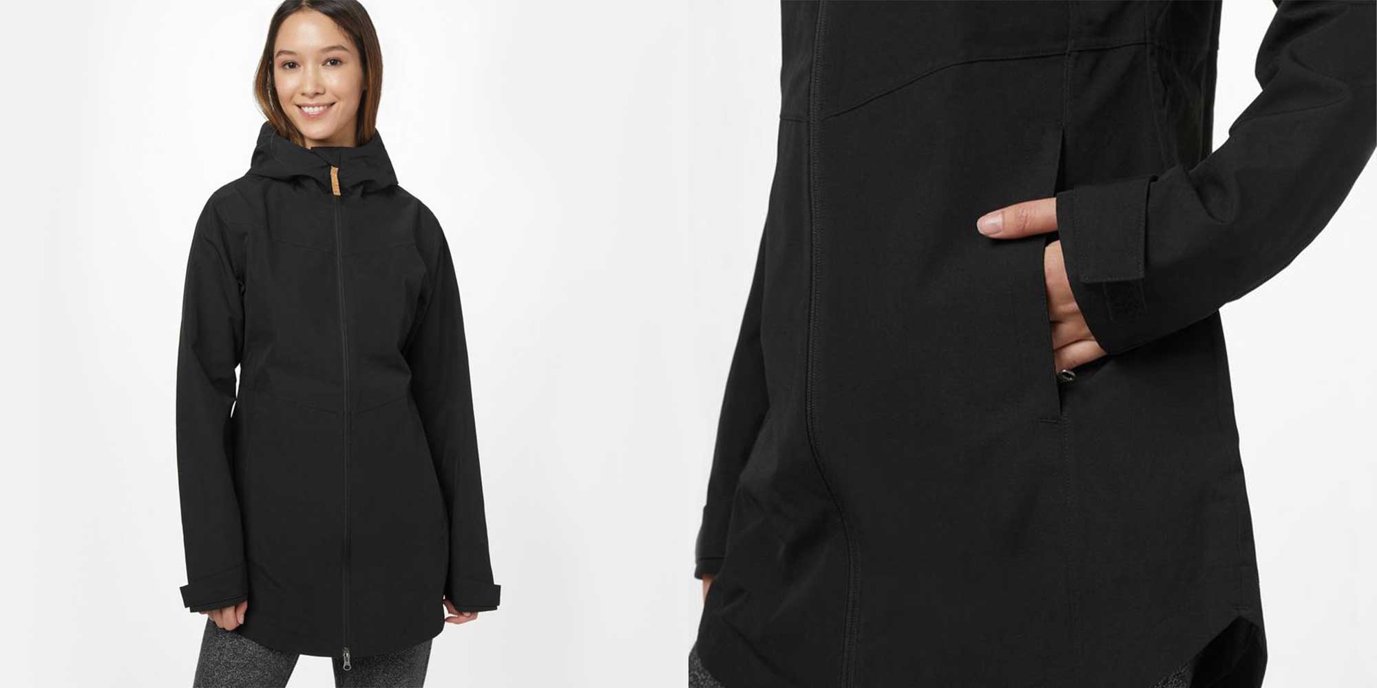 woman wearing dark rain coat by tentree