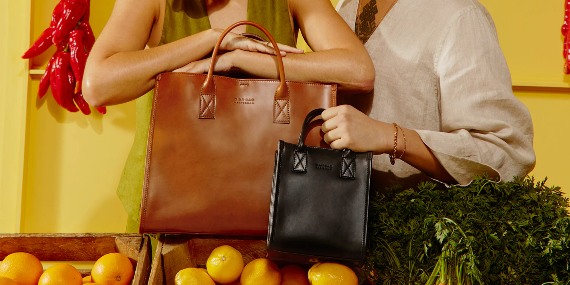 Large brown and small black tote bags by O My Bag.