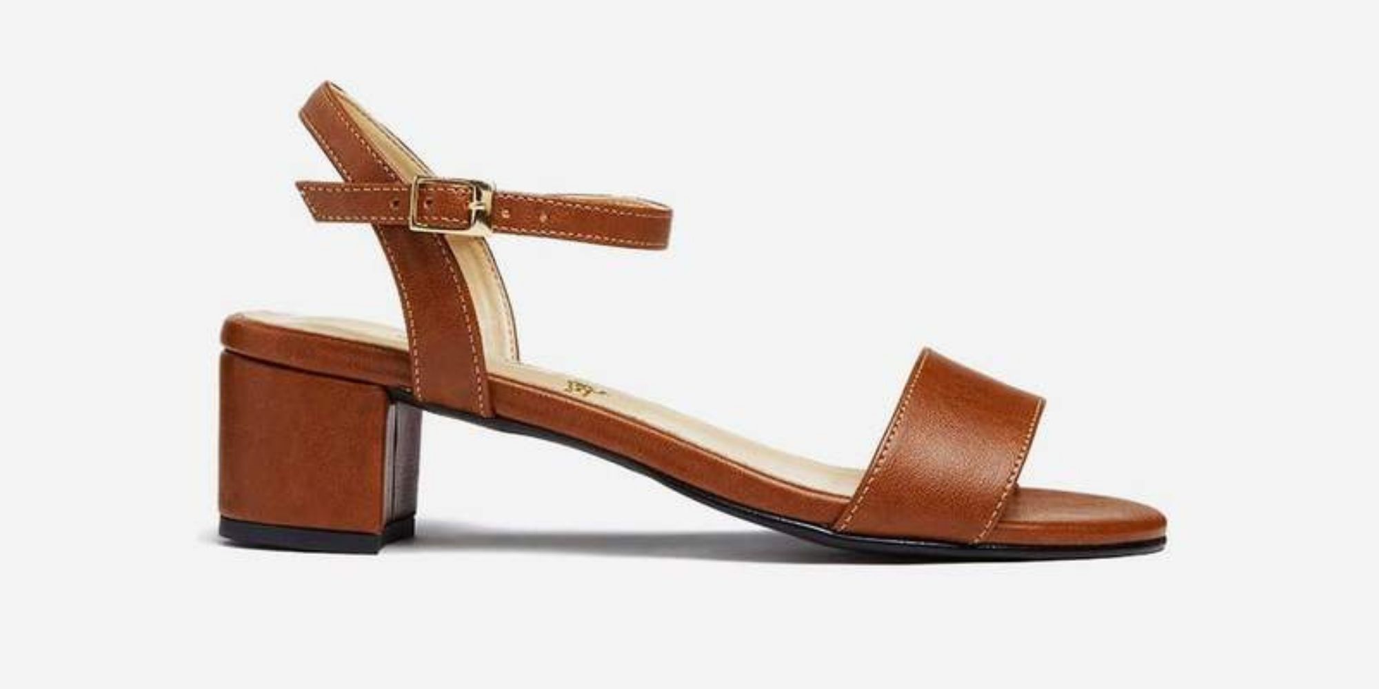 Close up of a tan vegan leather heeled sandal by Will's Vegan Store.