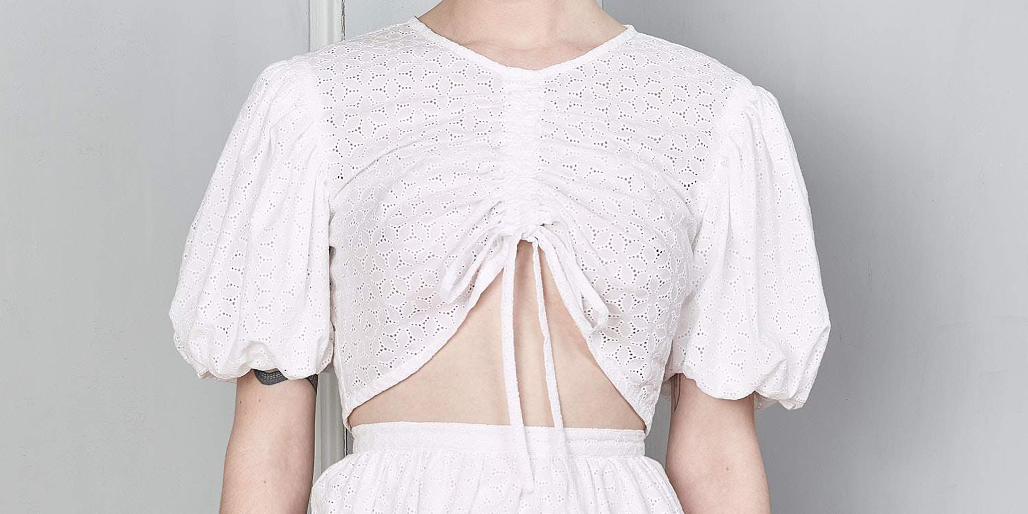 Woman in ruched sustainable cottagecore style top by Kalaurie