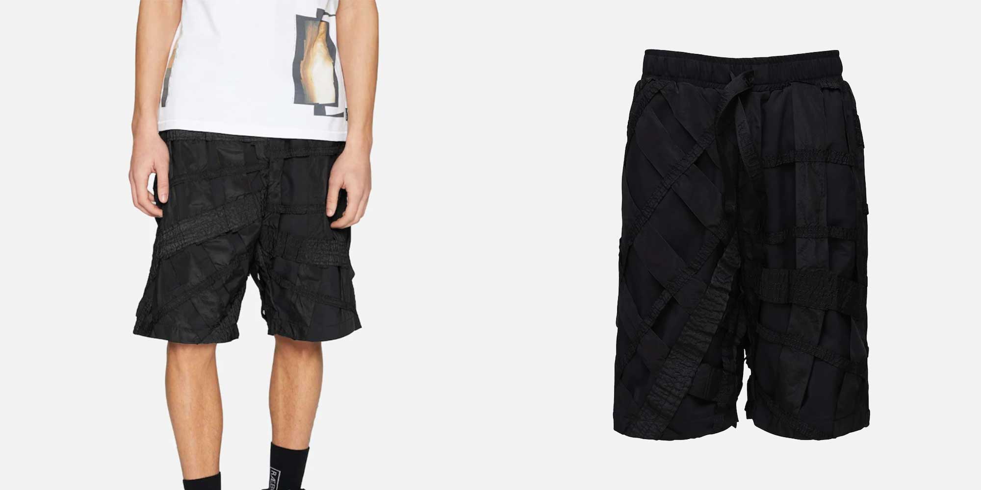 man wearing limited edition black shorts by raeburn