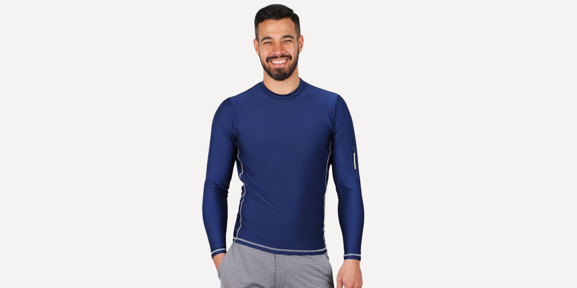 man wearing navy blue recycled PET plastic rashguard by Loop Swim