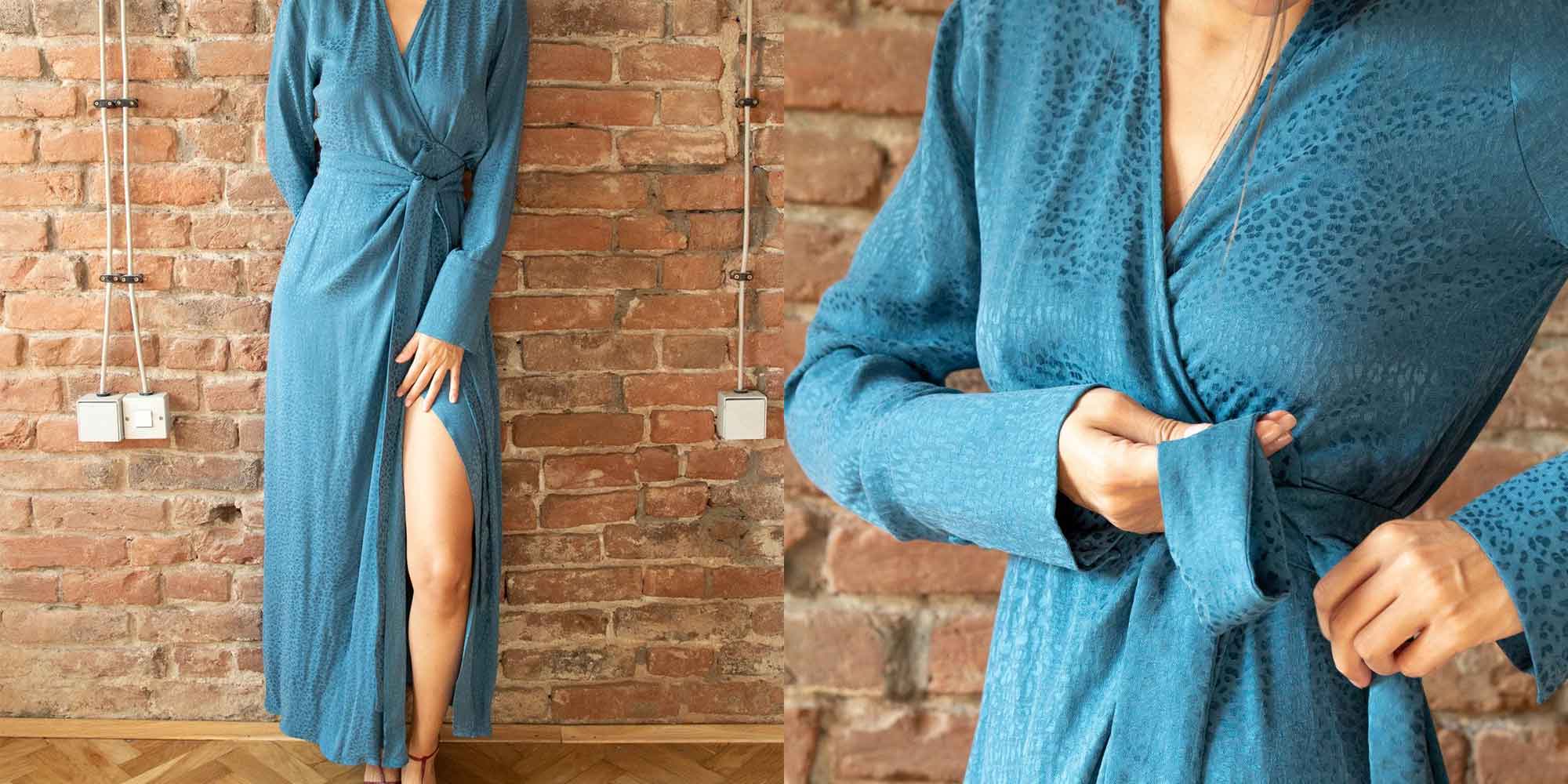 close up of a woman wearing a teal maxi dress by bastet noir