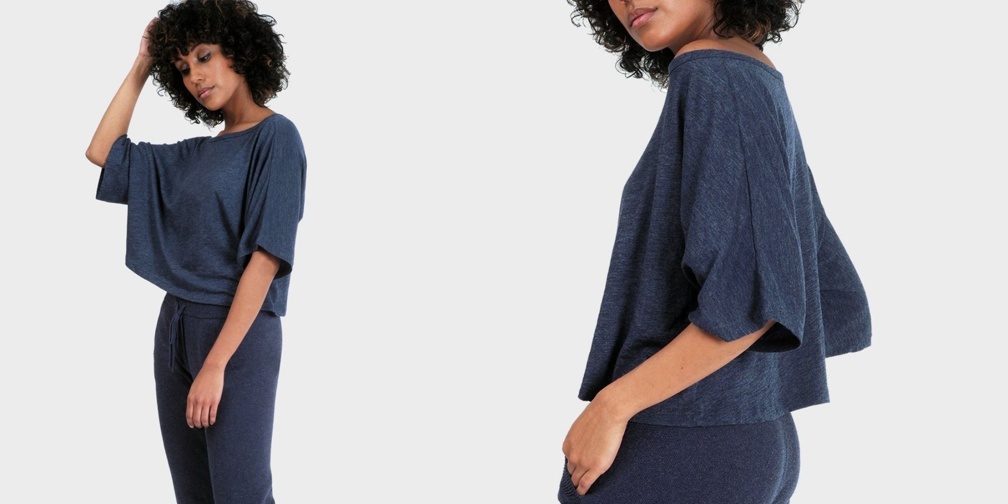 Person wearing navy blue athleisure crop top ethically made by 337 BRAND.