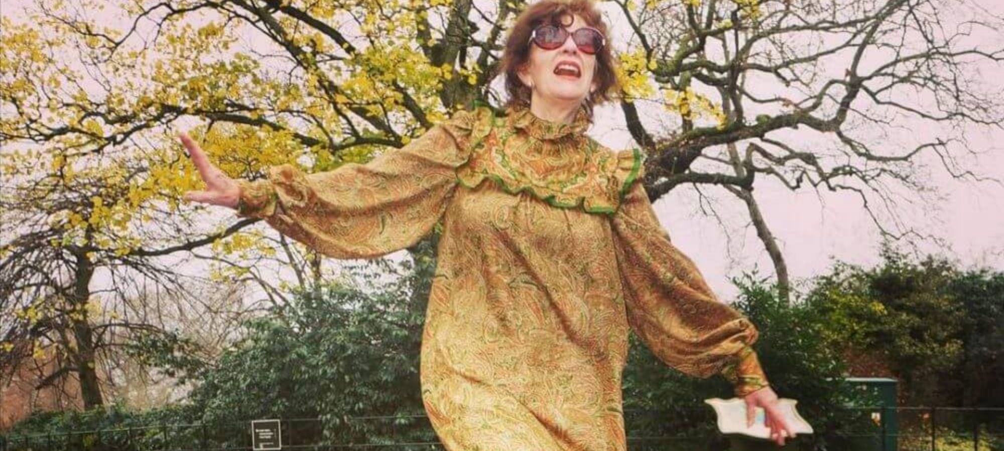 woman wearing recycled silk dress by Bouganvillea London