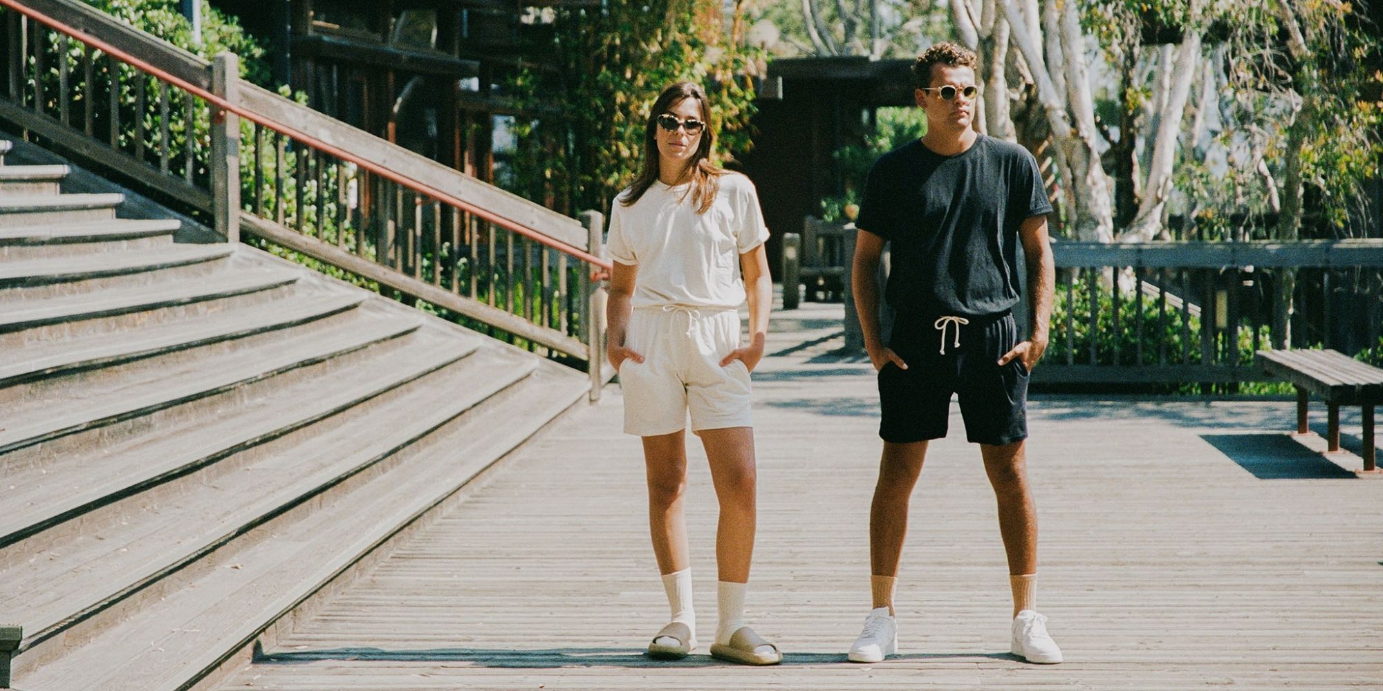 people outdoors wearing organic cotton shorts in black and white by Harvest & Mill