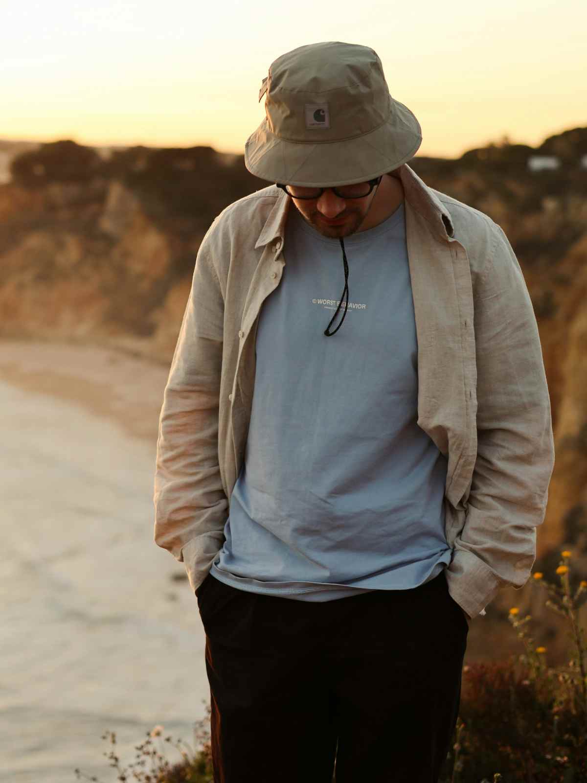 person wearing carhartt wip