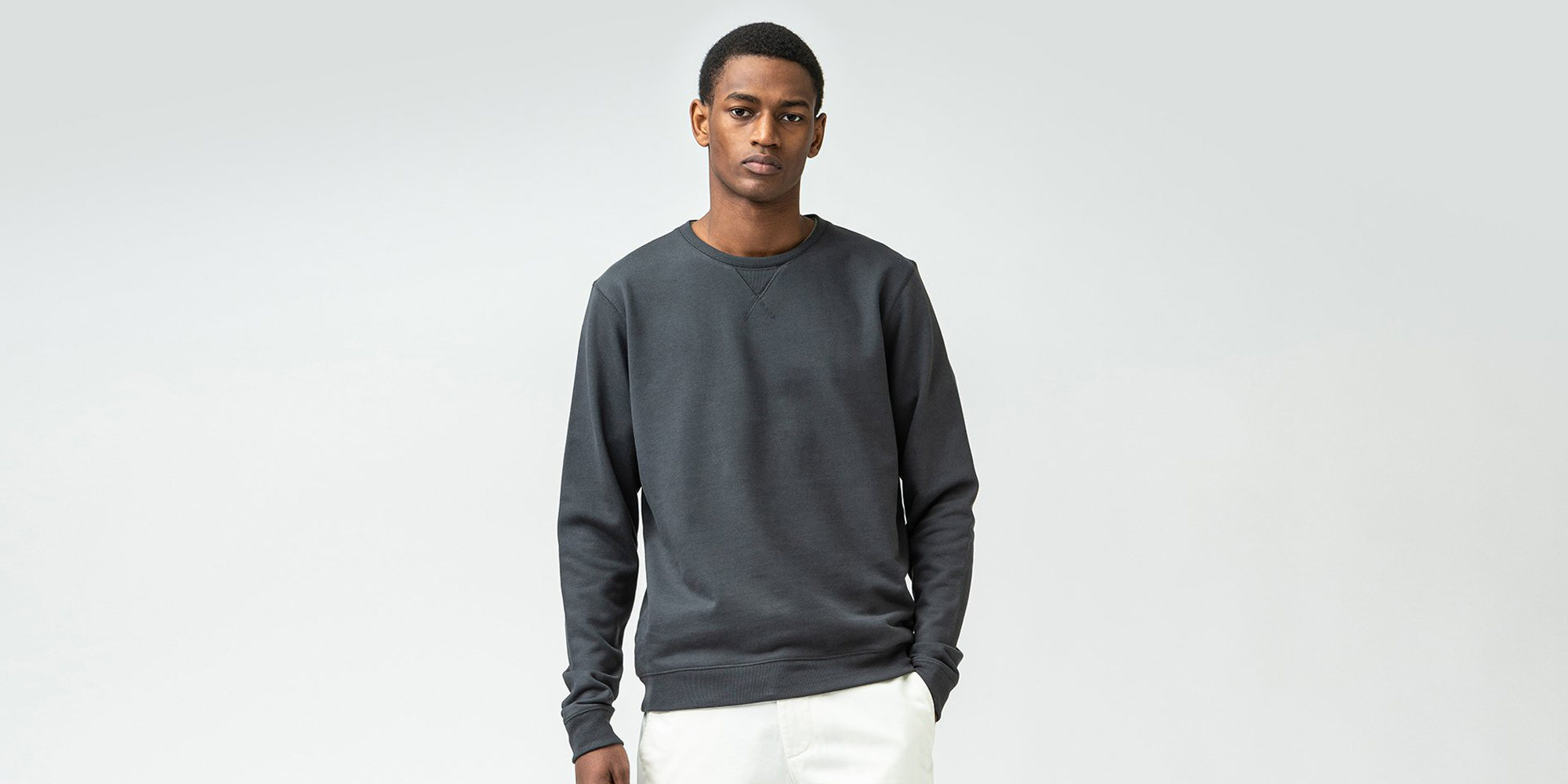 Man in sustainable ISTO crewneck