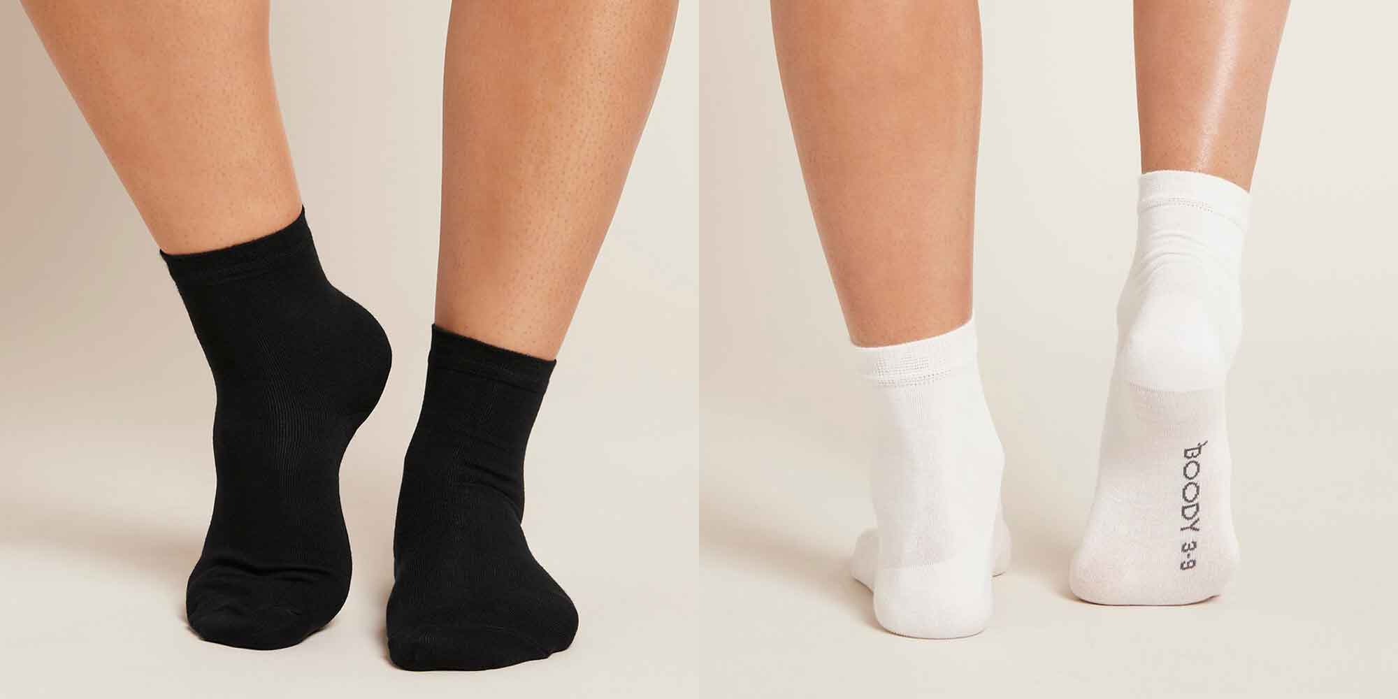 a black and a white pair of bamboo sock by Boody